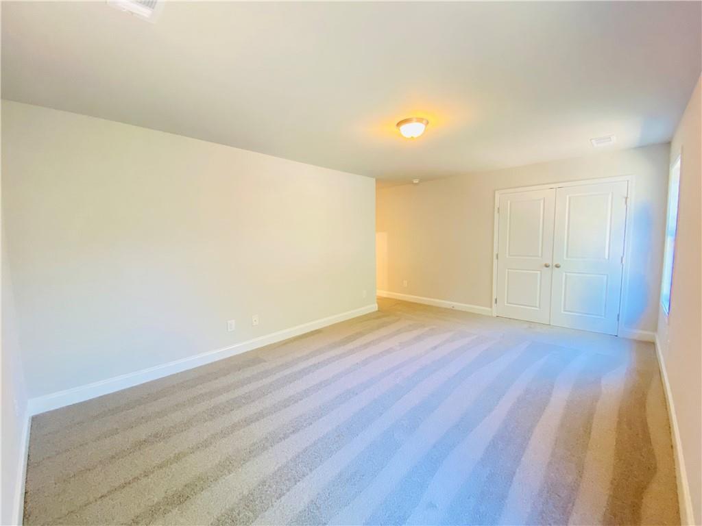 1099 North Village Drive Decatur, GA 30032 - Photo 11 of 23 wooden floor in an empty room
