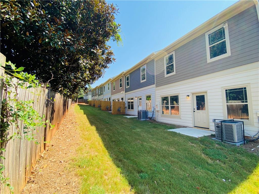 1099 North Village Drive Decatur, GA 30032 - Photo 21 of 23 a front view of house with a garden