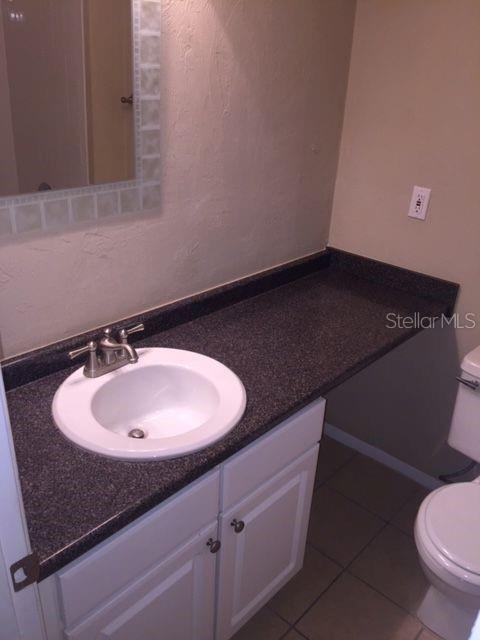 507 Northwest 39th Road, Unit 310 Gainesville, FL 32607 - Photo 14 of 18 a bathroom with a sink and a toilet