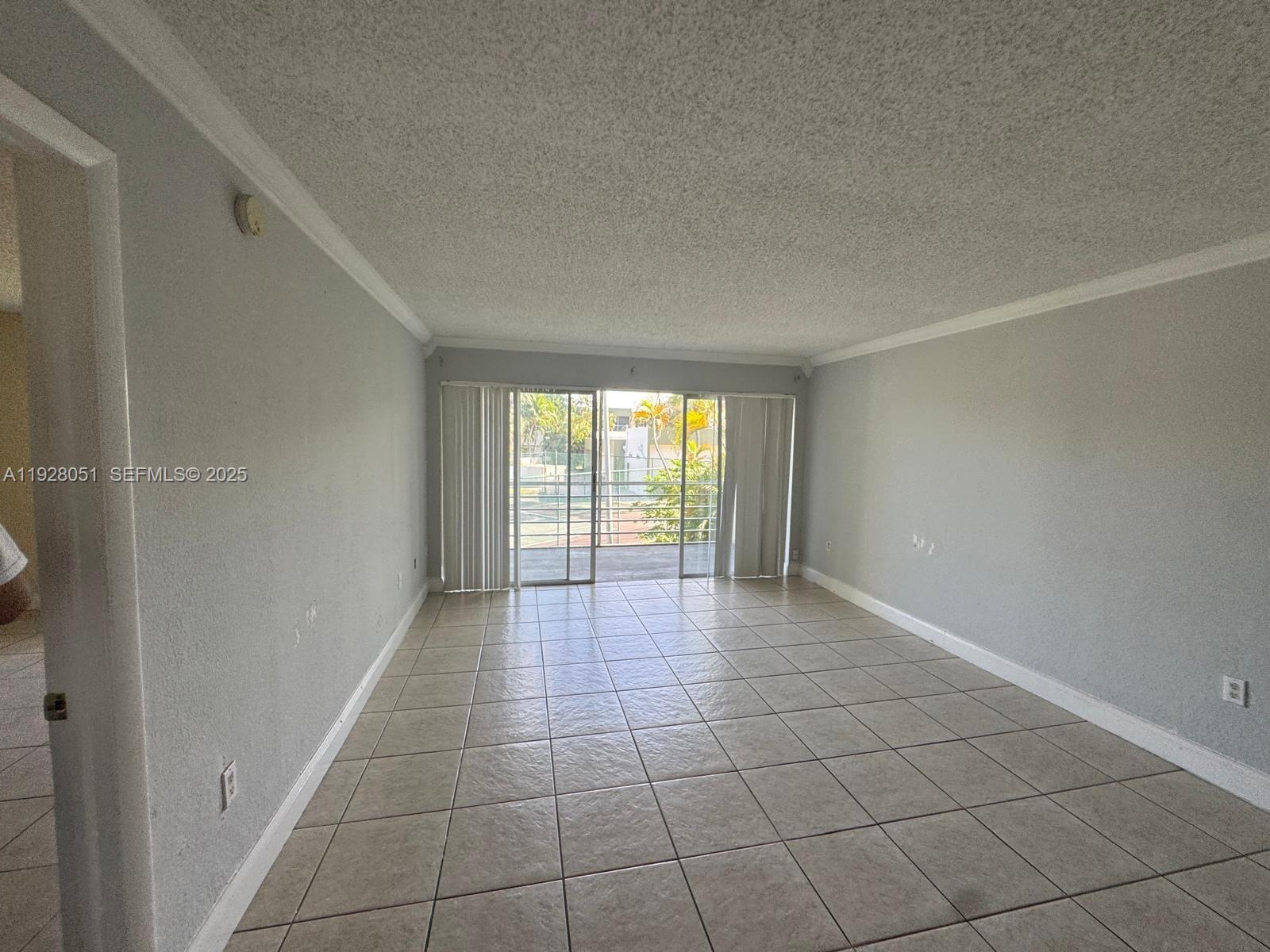 Spring Tree Sunrise, FL 33351 - Photo 3 of 3 a view of an empty room with a window
