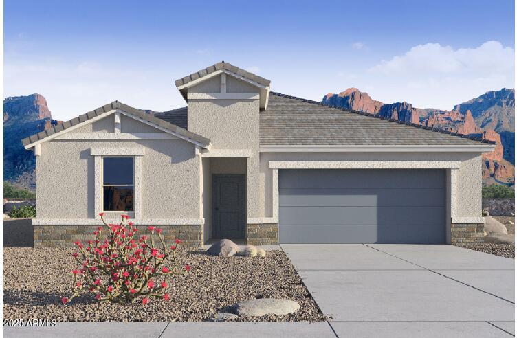 2170 West Starfire Avenue Apache Junction, AZ 85120 - Photo 1 of 26 a front view of a house with a yard and garage
