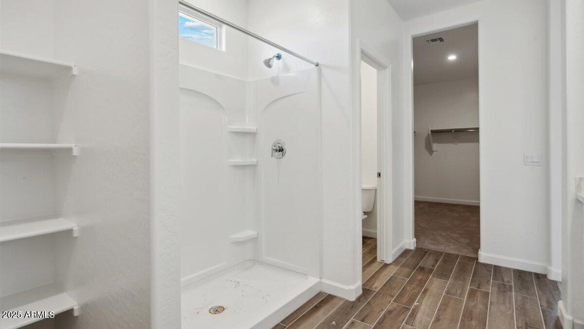 2170 West Starfire Avenue Apache Junction, AZ 85120 - Photo 12 of 26 a bathroom with a shower and a sink