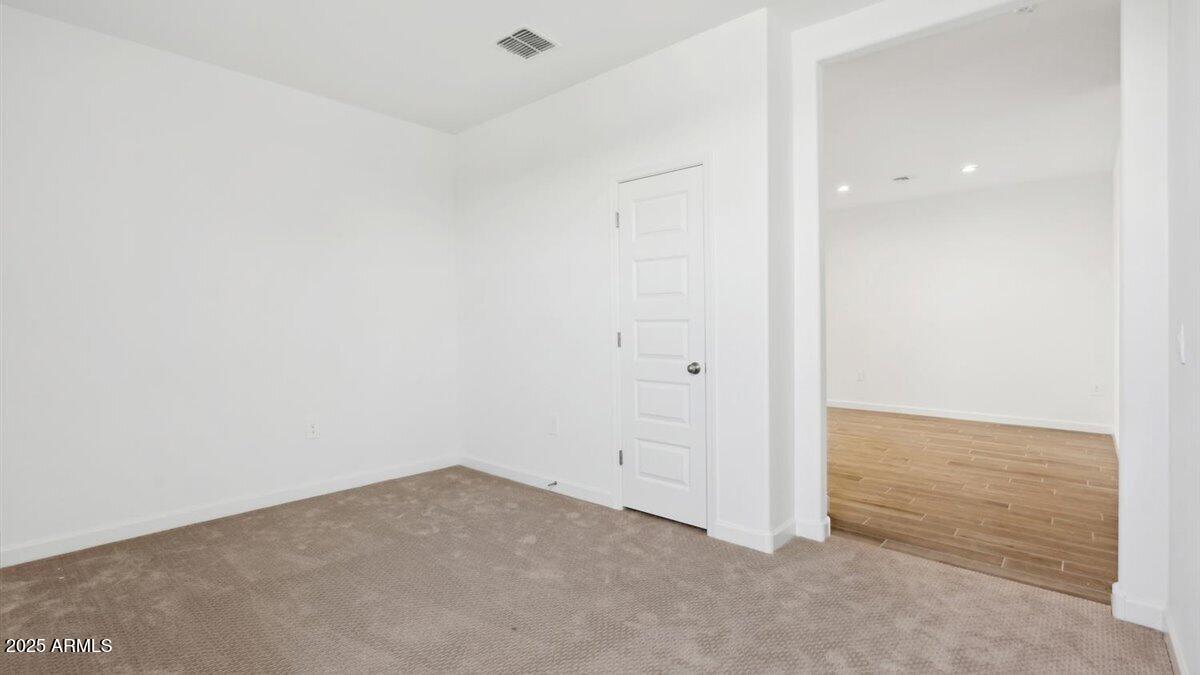 2170 West Starfire Avenue Apache Junction, AZ 85120 - Photo 21 of 26 an empty room with an entryway