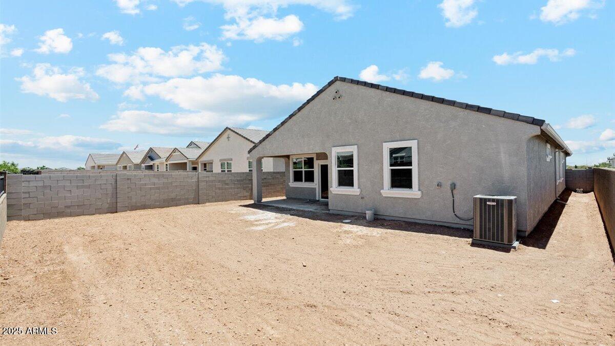 2170 West Starfire Avenue Apache Junction, AZ 85120 - Photo 26 of 26 a view of a house with wooden fence