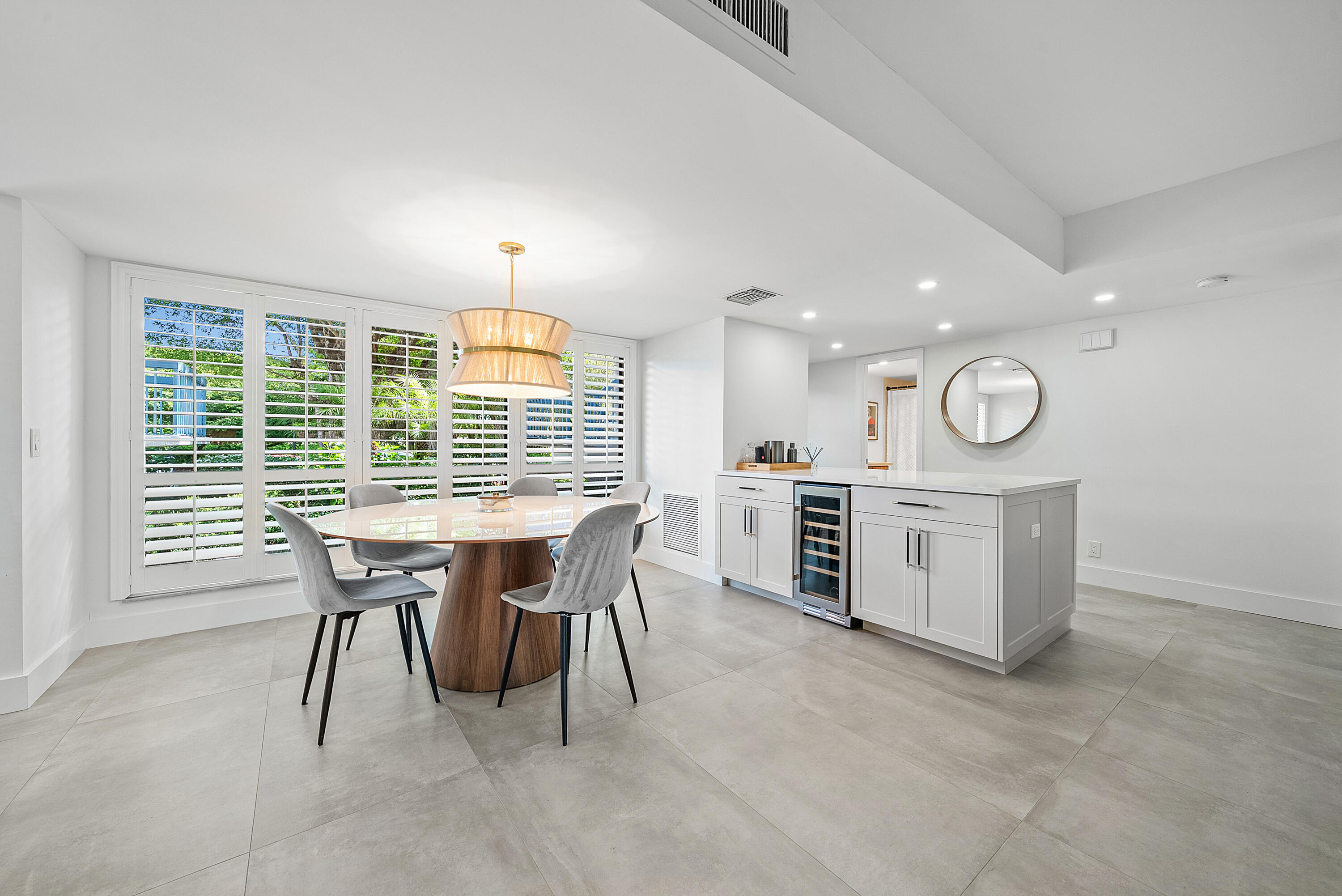 4116 North Quail Ridge Drive, Unit A Boynton Beach, FL 33436 - Photo 13 of 41 a view of a dining room with furniture window and outside view