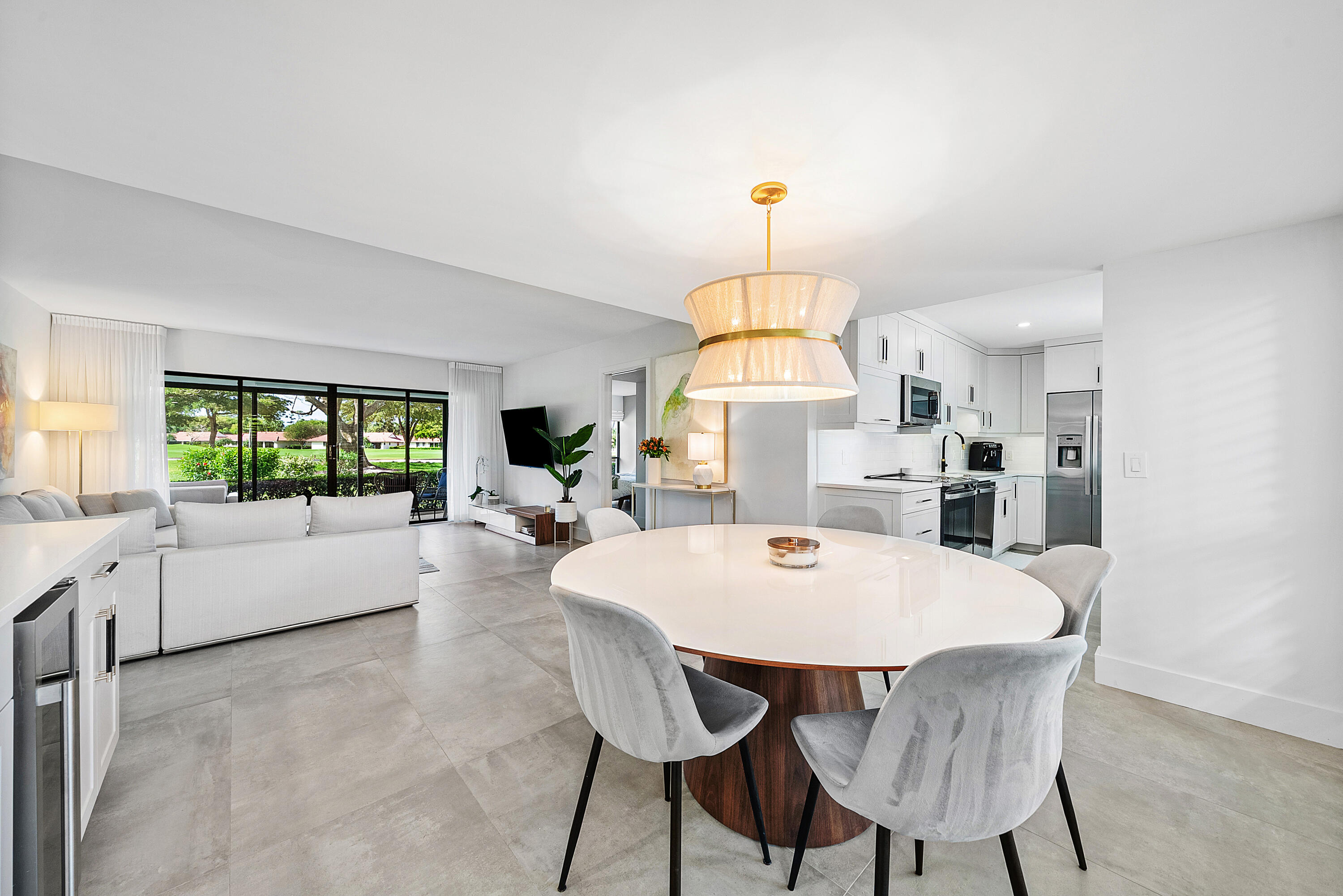 4116 North Quail Ridge Drive, Unit A Boynton Beach, FL 33436 - Photo 15 of 41 a view of a dining room with furniture window and outside view