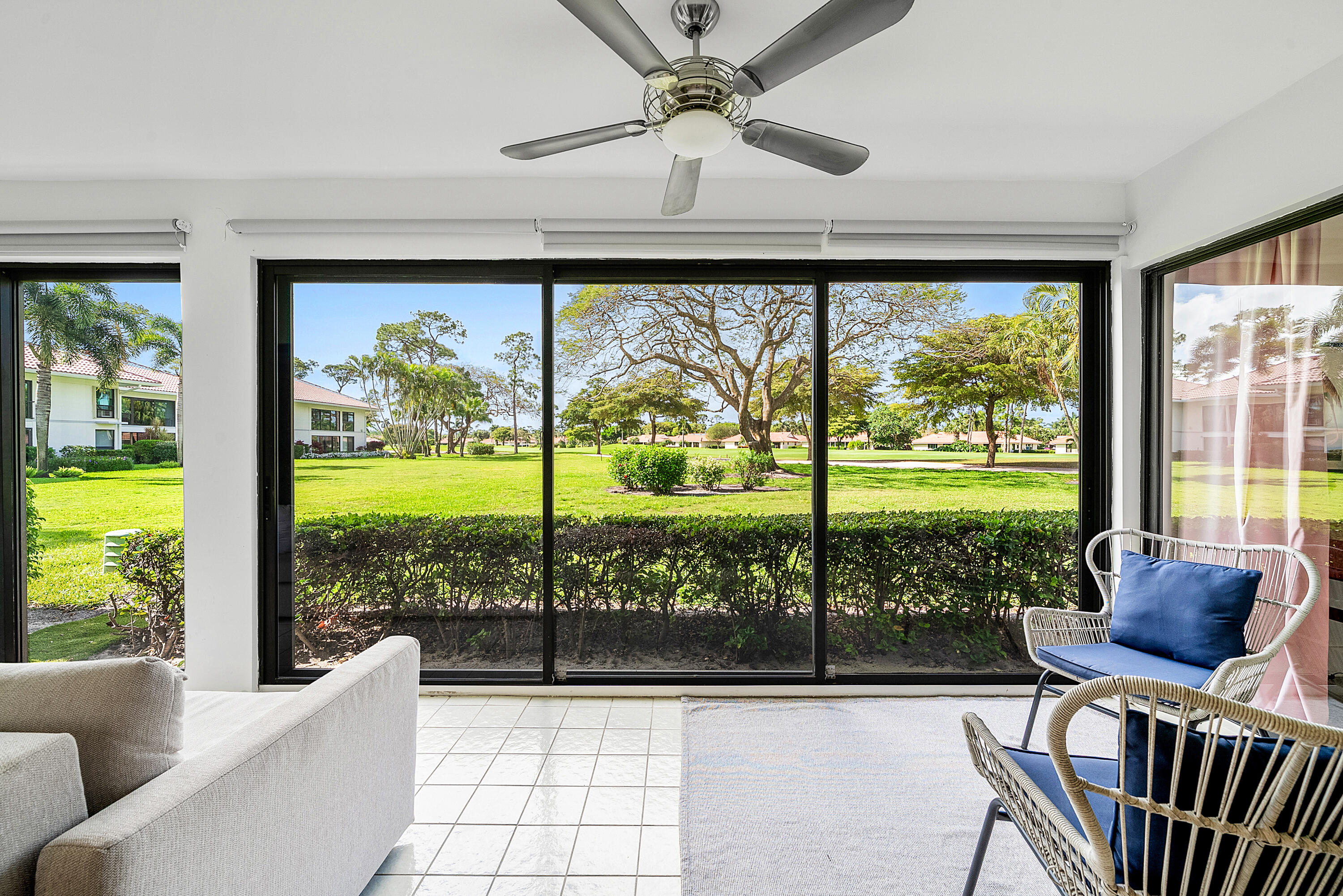 4116 North Quail Ridge Drive, Unit A Boynton Beach, FL 33436 - Photo 20 of 41 a living room with hardwood floor and balcony view