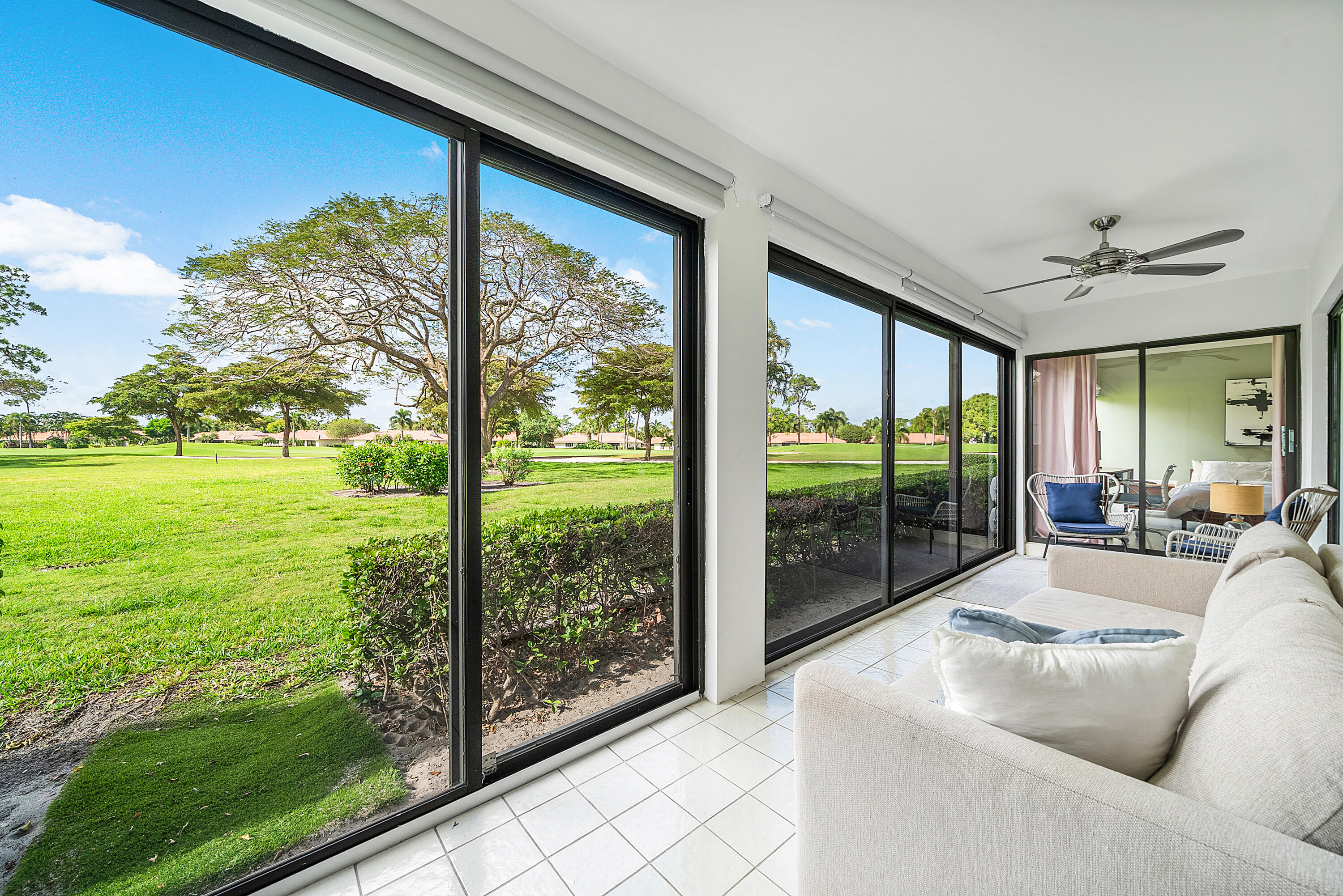 4116 North Quail Ridge Drive, Unit A Boynton Beach, FL 33436 - Photo 21 of 41 a living room with furniture and garden view