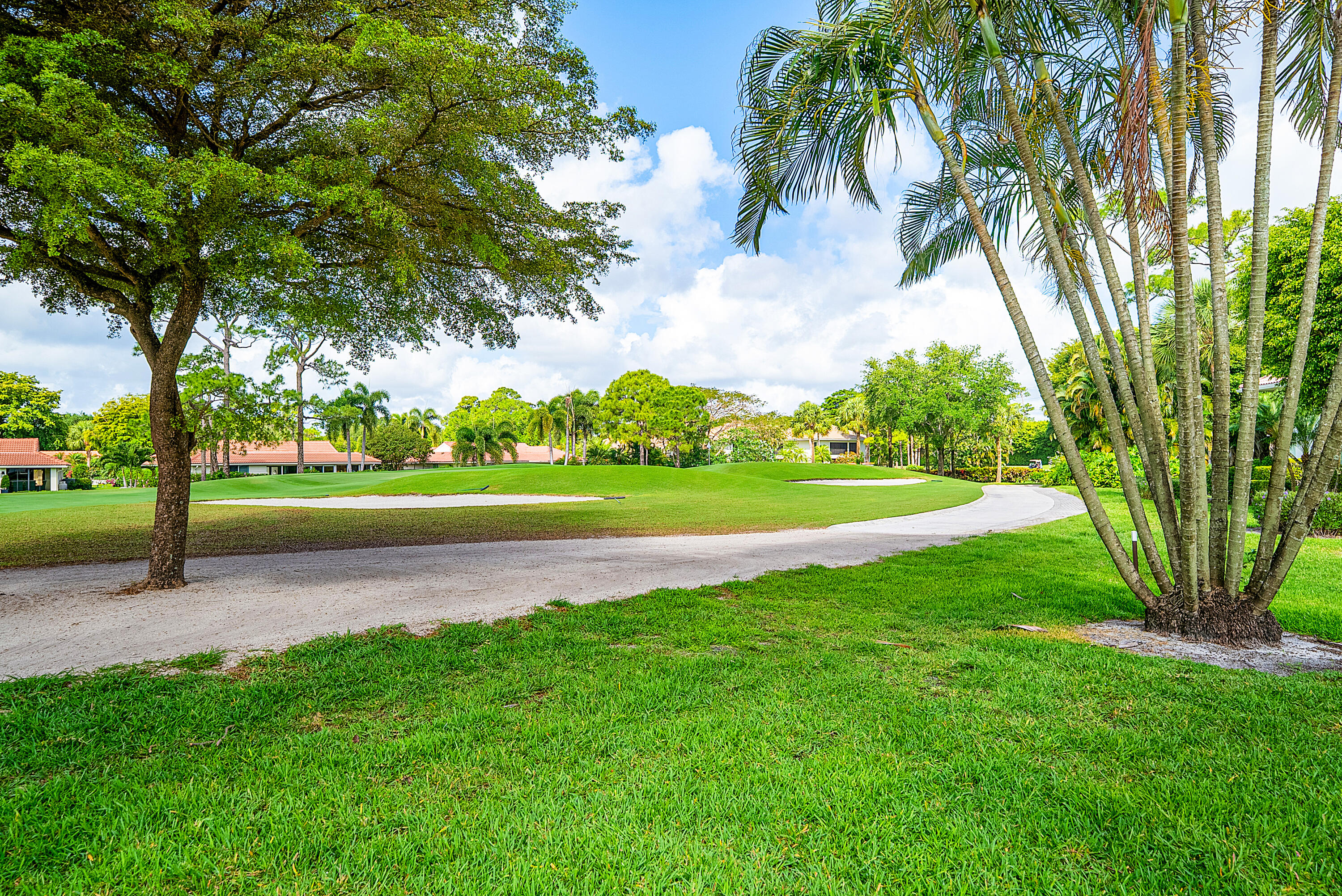 4116 North Quail Ridge Drive, Unit A Boynton Beach, FL 33436 - Photo 31 of 41 a view of a park with large trees