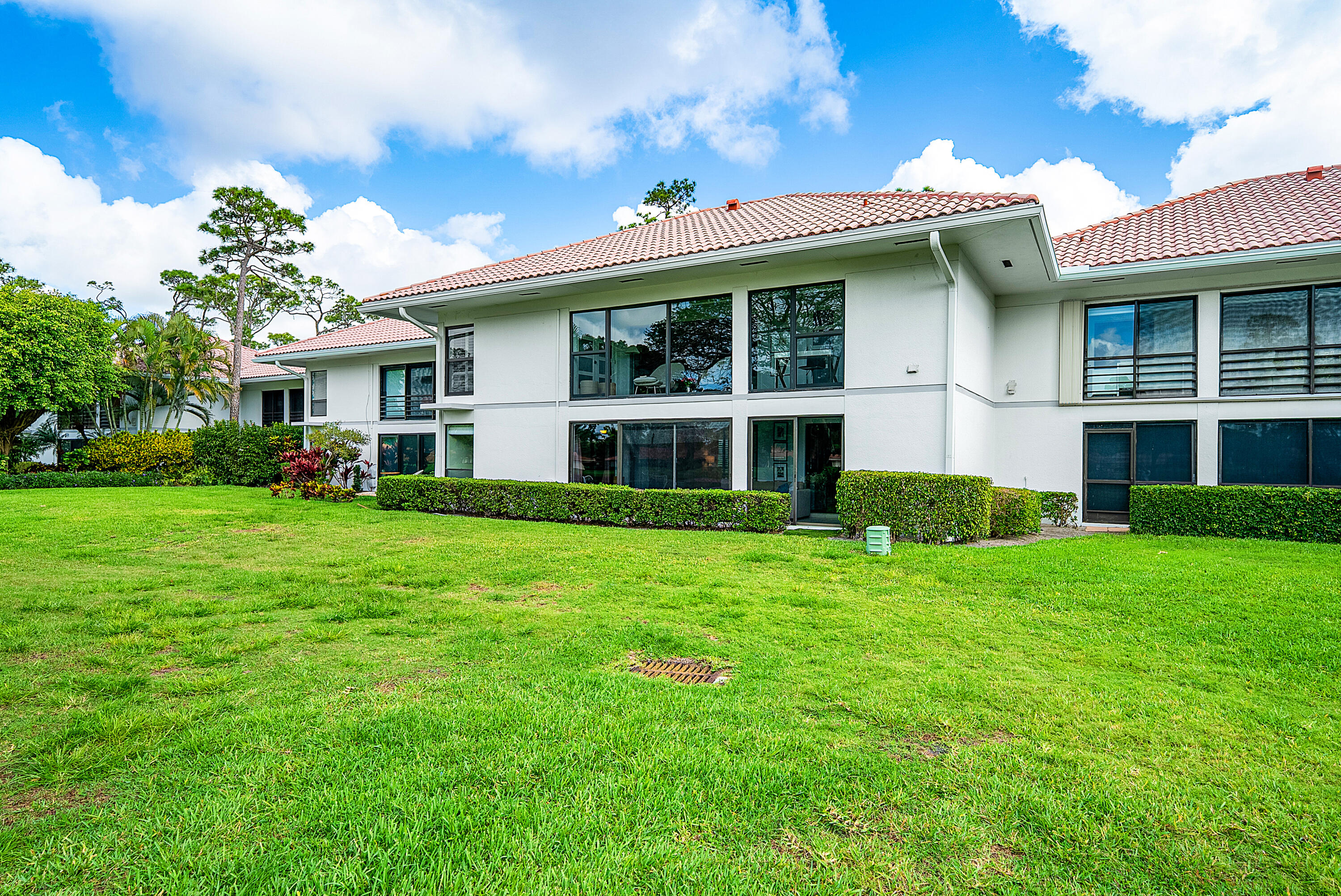4116 North Quail Ridge Drive, Unit A Boynton Beach, FL 33436 - Photo 33 of 41 a front view of a house with a yard