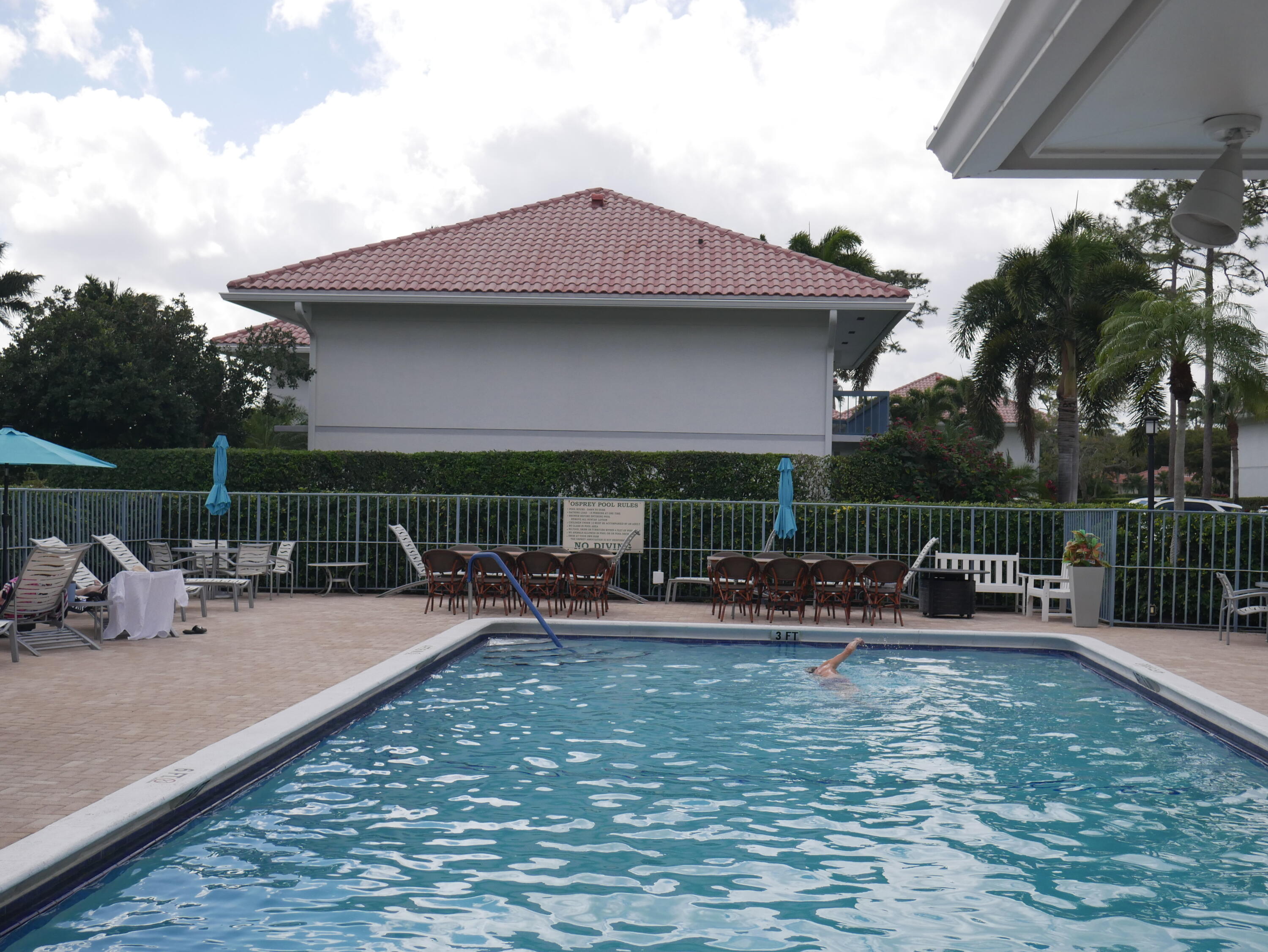 4116 North Quail Ridge Drive, Unit A Boynton Beach, FL 33436 - Photo 37 of 41 a view of house with outdoor seating area