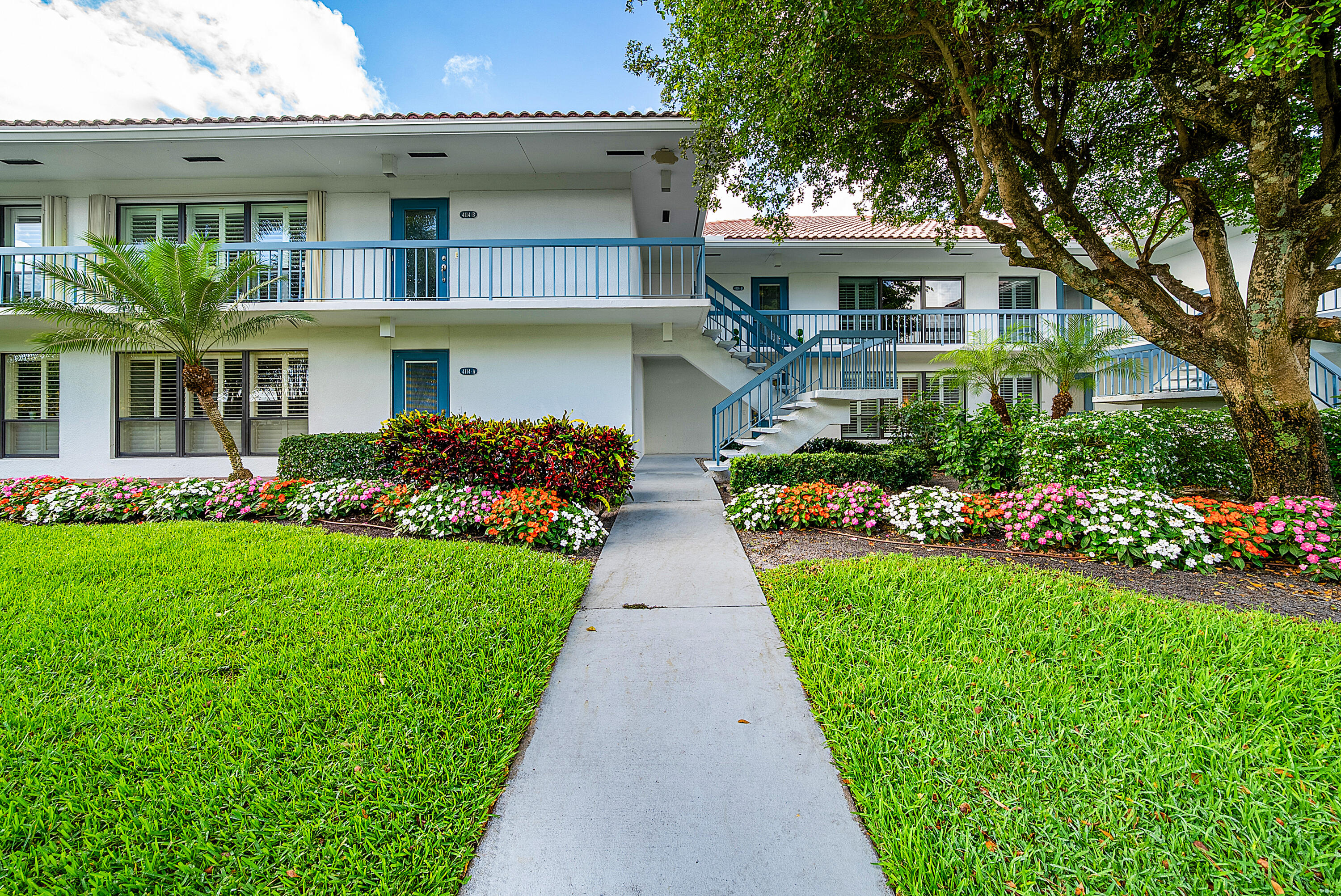 4116 North Quail Ridge Drive, Unit A Boynton Beach, FL 33436 - Photo 7 of 41 a front view of house with yard