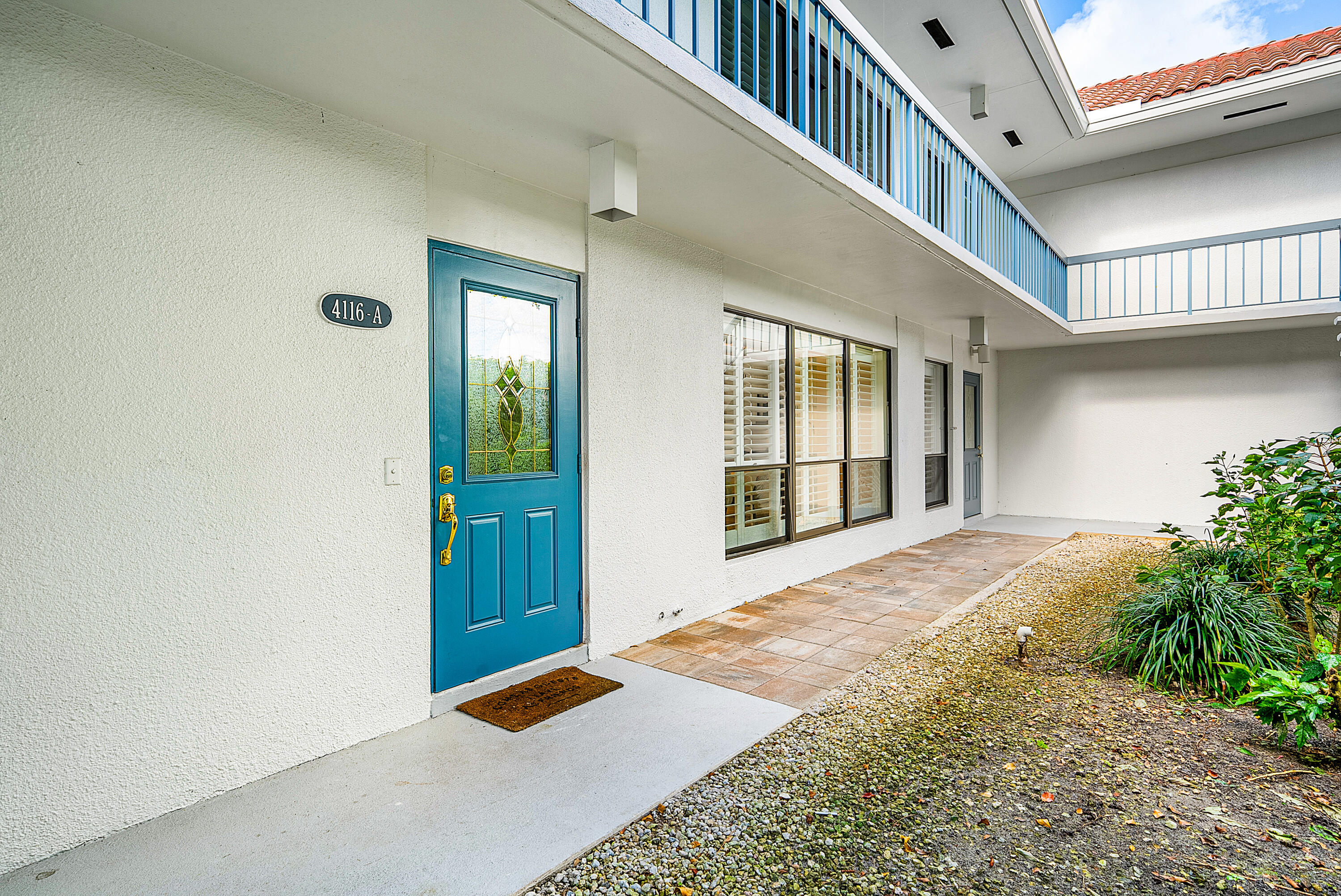 4116 North Quail Ridge Drive, Unit A Boynton Beach, FL 33436 - Photo 9 of 41 a bedroom with windows