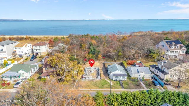 an aerial view of beach and ocean