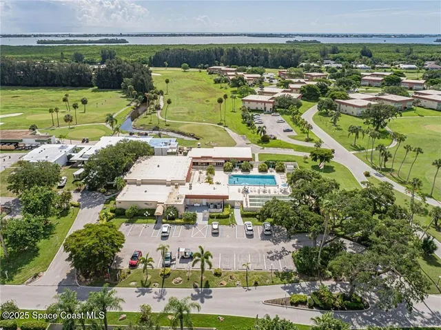 an aerial view of a city with lots of residential buildings swimming pool and outdoor space