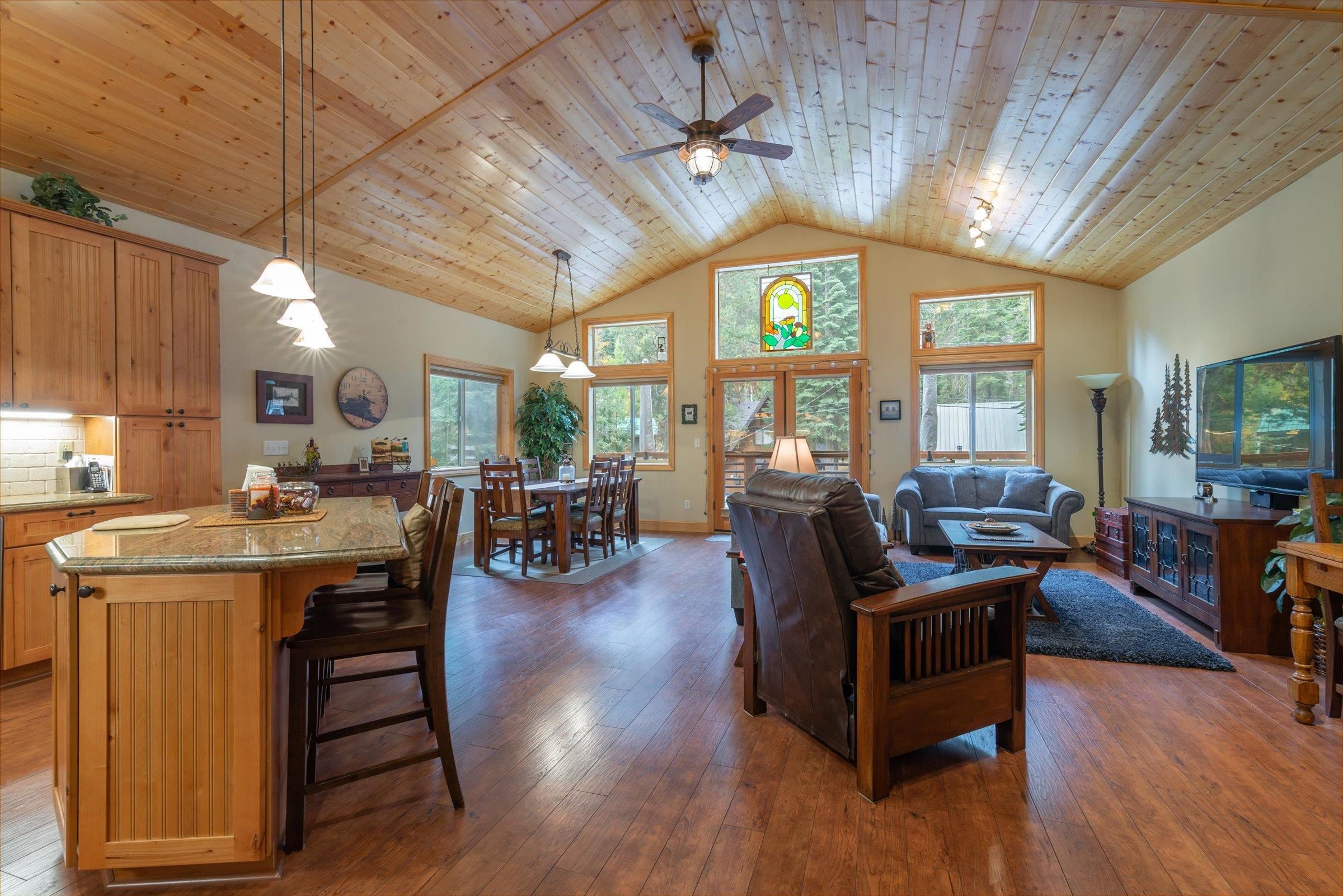 10308 Washoe Road Truckee, CA 96161 - Photo 2 of 21 a view of a dining room with furniture window and wooden floor