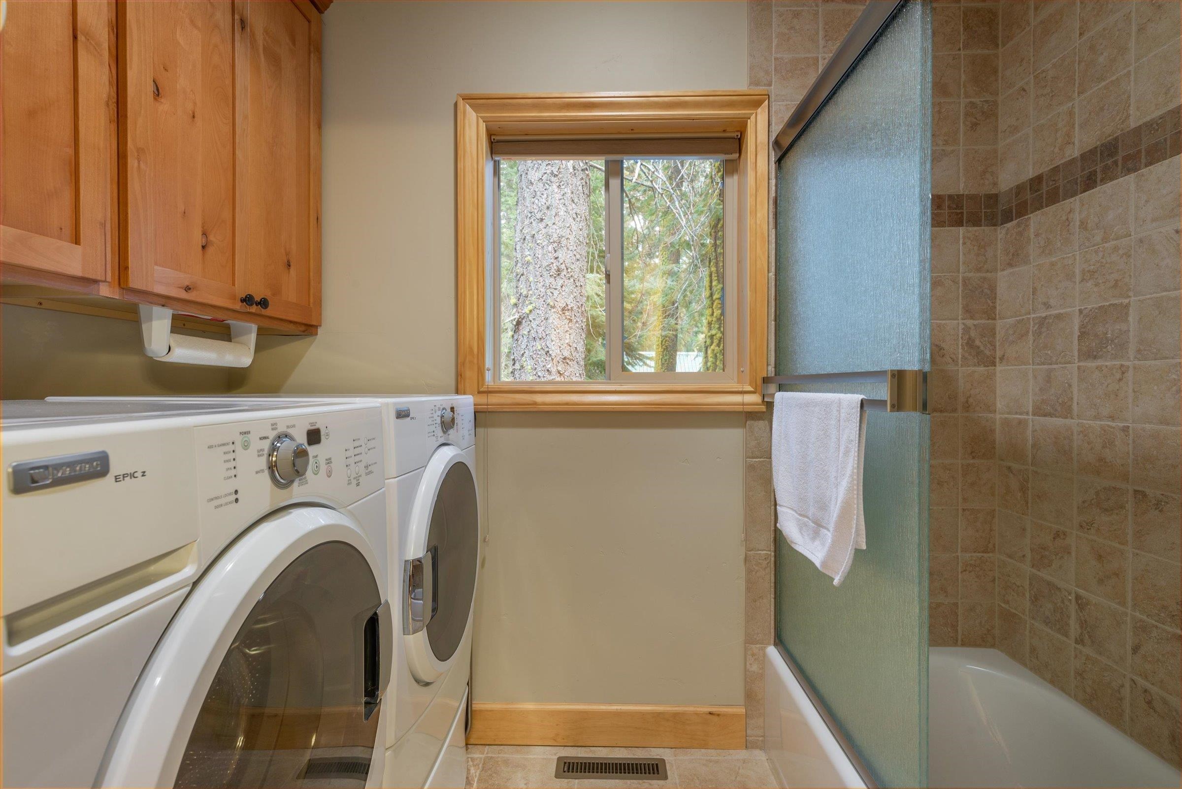 10308 Washoe Road Truckee, CA 96161 - Photo 11 of 21 a utility room with dryer and washer