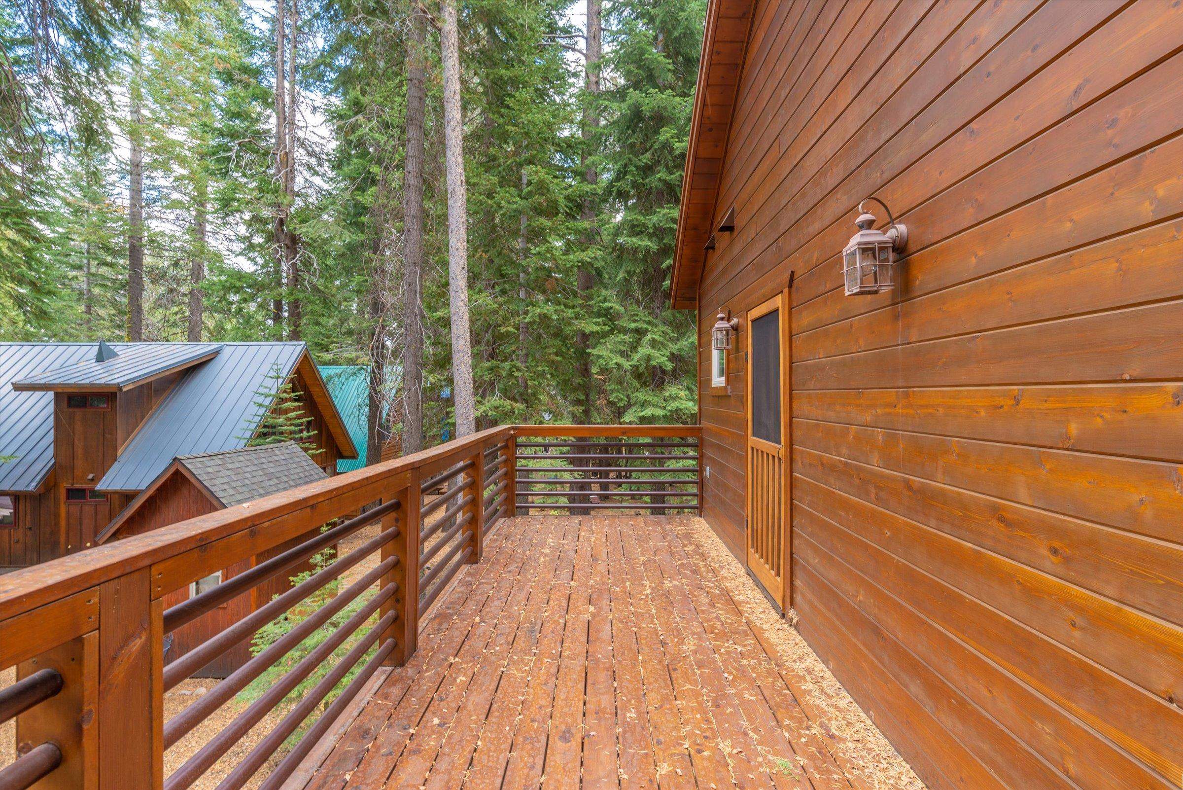 10308 Washoe Road Truckee, CA 96161 - Photo 16 of 21 a view of balcony with wooden floor and fence