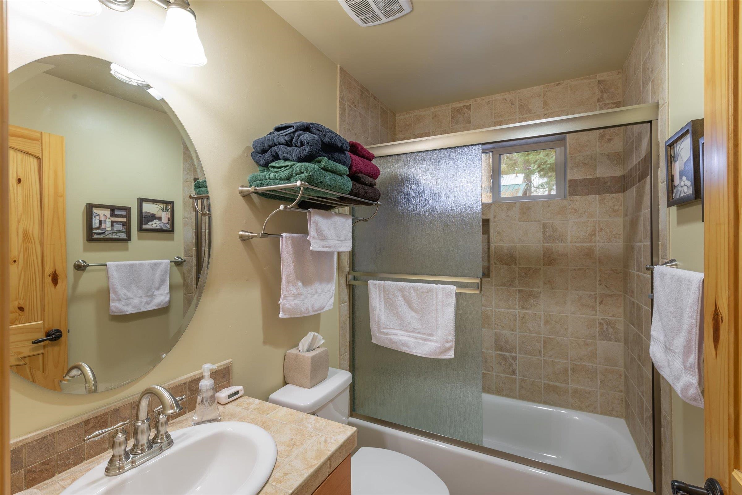 10308 Washoe Road Truckee, CA 96161 - Photo 20 of 21 a bathroom with a sink a toilet and shower
