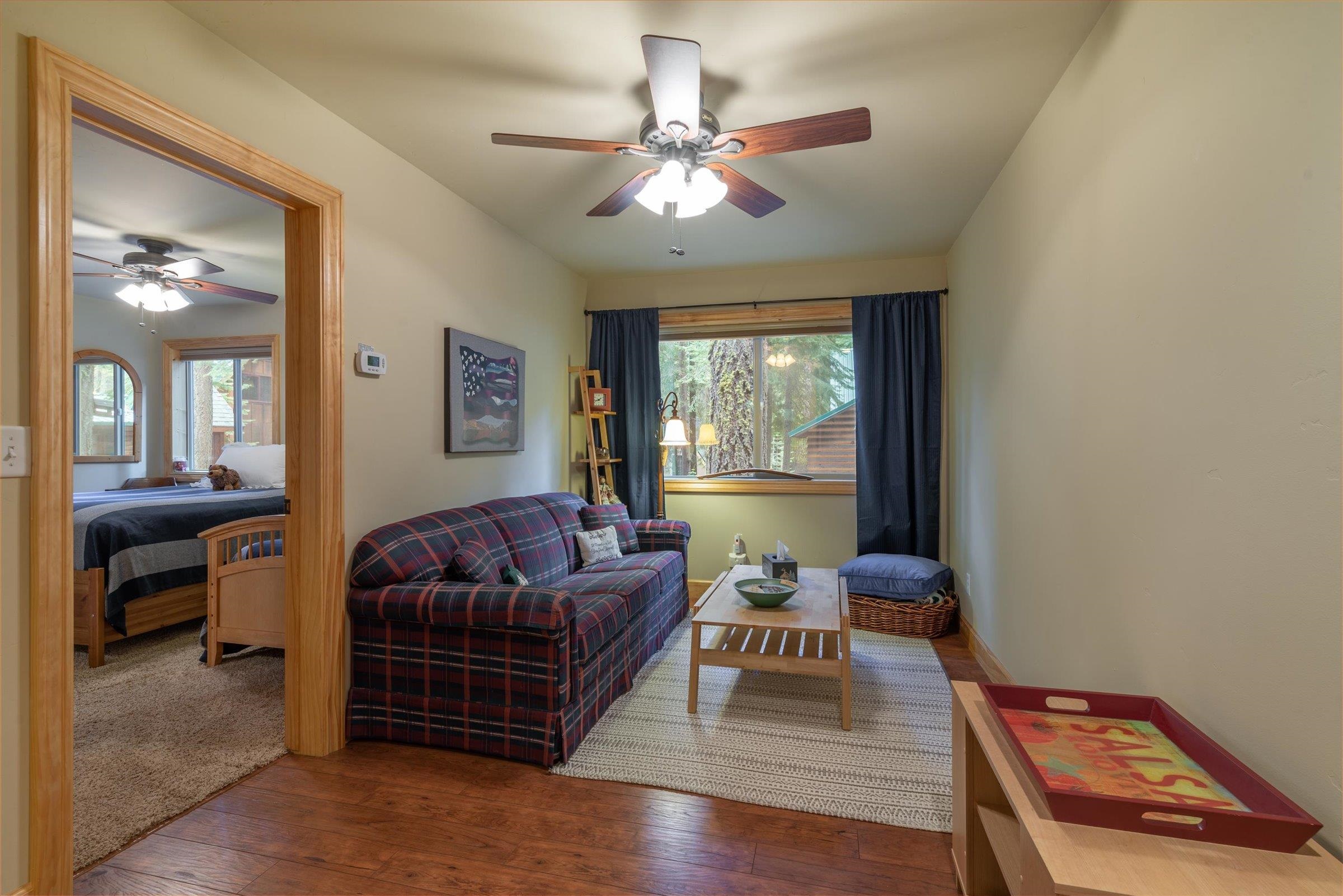 10308 Washoe Road Truckee, CA 96161 - Photo 21 of 21 a living room with furniture and a large window