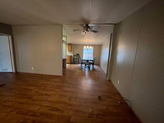 2830 Sha-Al Road Roanoke, VA 24014 - Photo 5 of 17 an empty room with wooden floor and a hallway