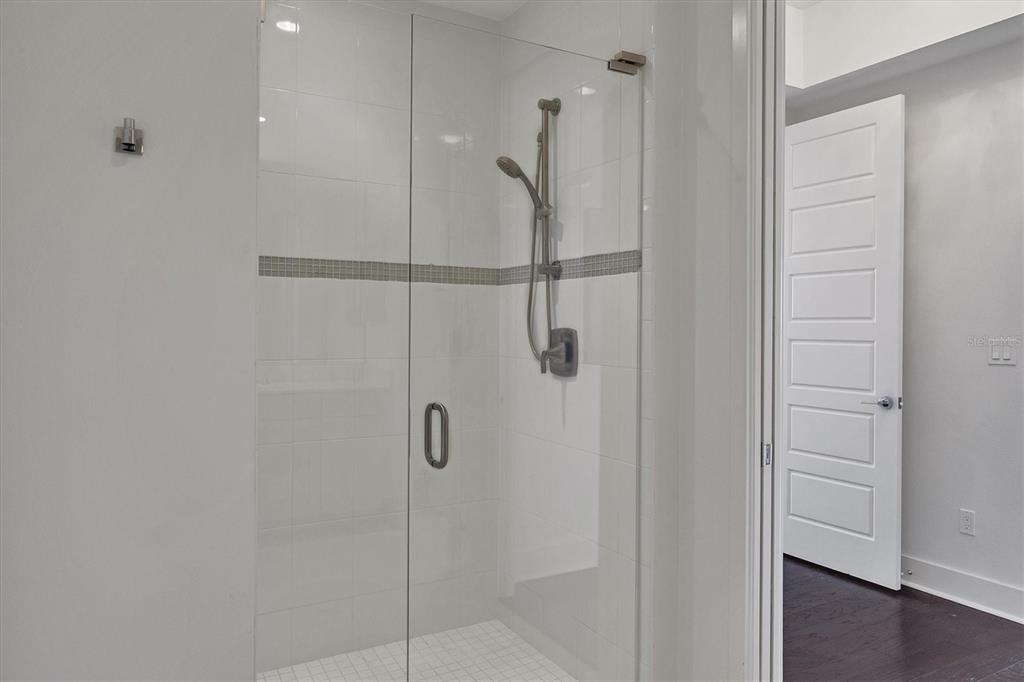 10530 Boardwalk Loop, Unit 601 Bradenton, FL 34202 - Photo 23 of 60 a bathroom with a shower