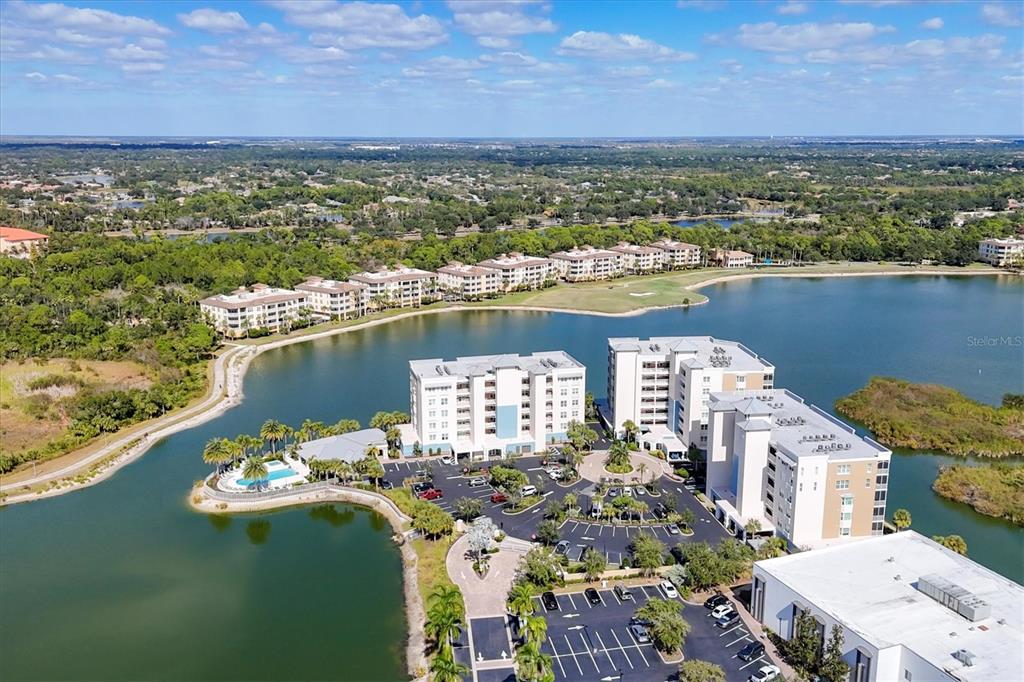 10530 Boardwalk Loop, Unit 601 Bradenton, FL 34202 - Photo 3 of 60 a view of a city and ocean view