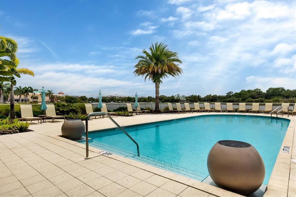 10530 Boardwalk Loop, Unit 601 Bradenton, FL 34202 - Photo 44 of 60 a view of roof deck with couches and sky view