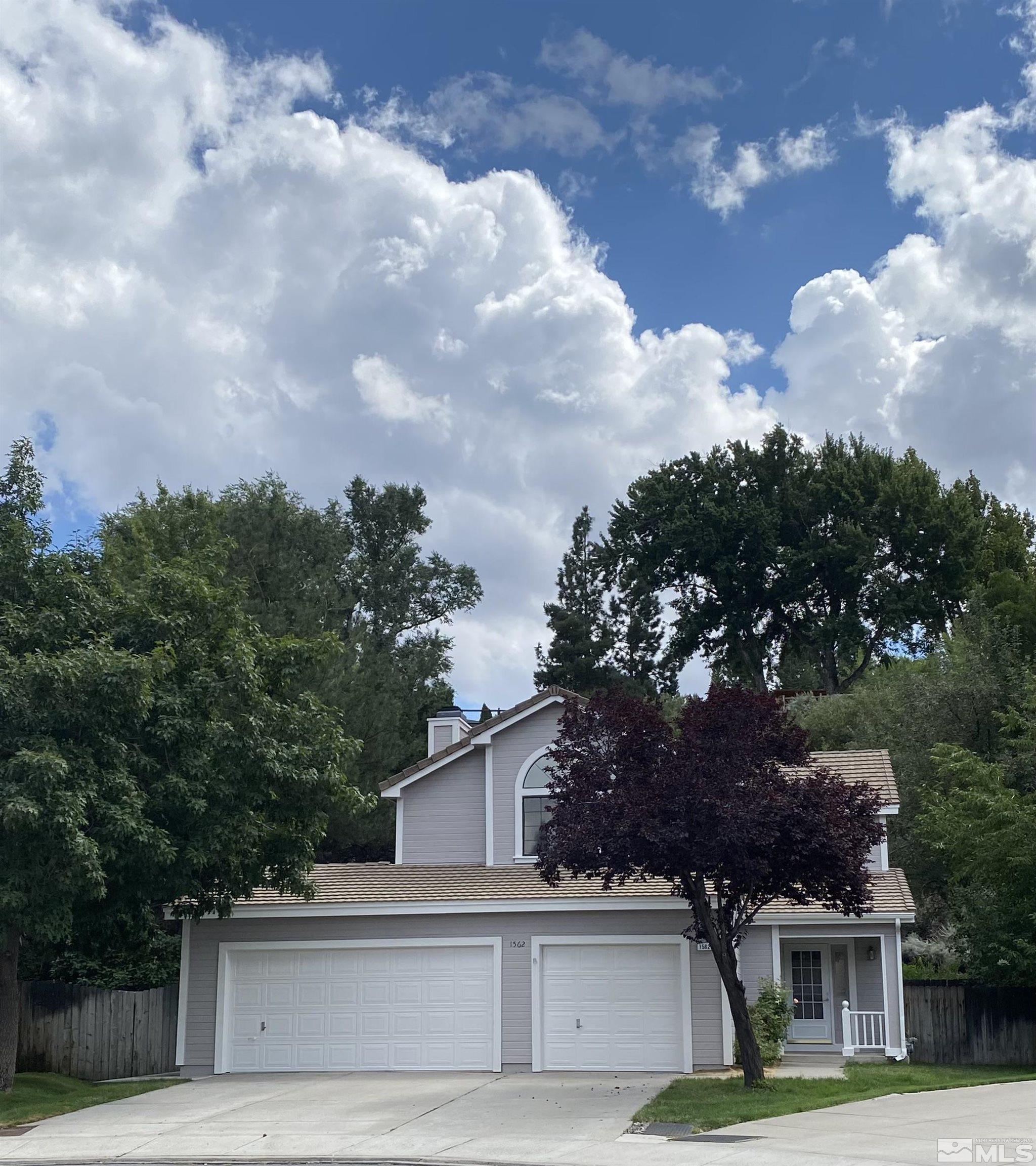 1562 Bramble Court Reno, NV 89509 - Photo 1 of 22 a view of house with outdoor space and garden