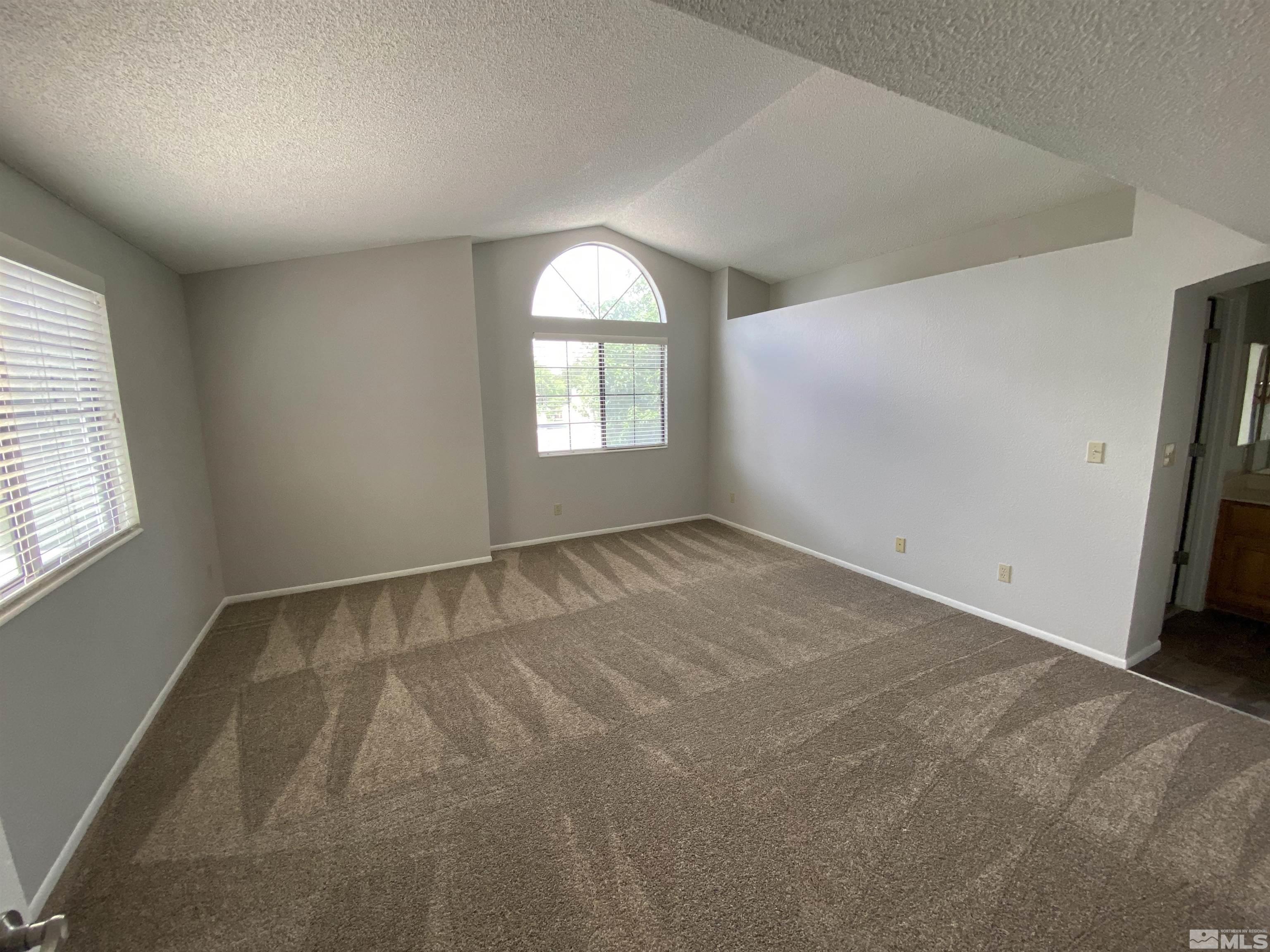 1562 Bramble Court Reno, NV 89509 - Photo 13 of 22 an empty room with a window