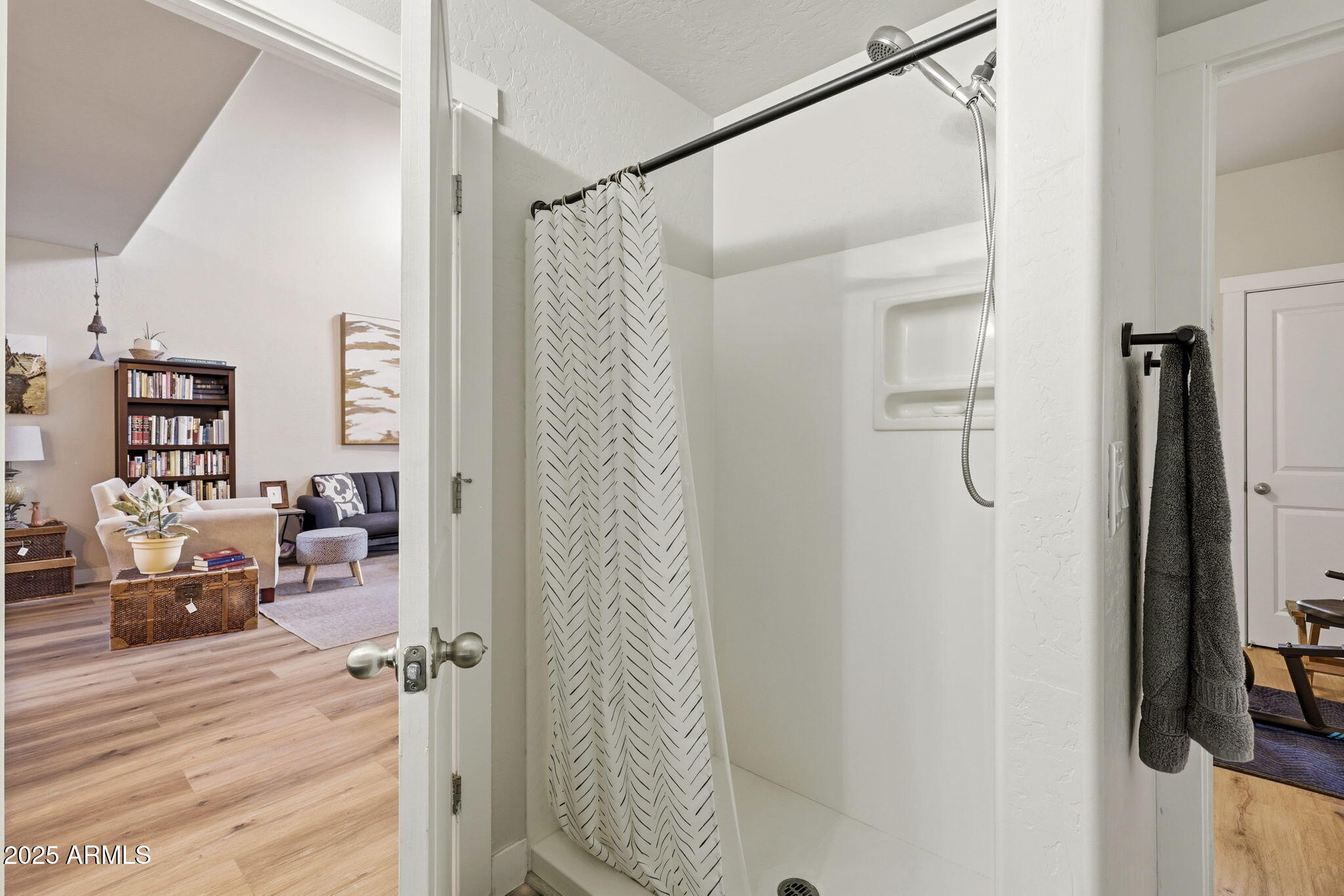 6168 West Starlight Ridge Parkway Lakeside, AZ 85929 - Photo 16 of 39 a view of a bedroom from a hallway
