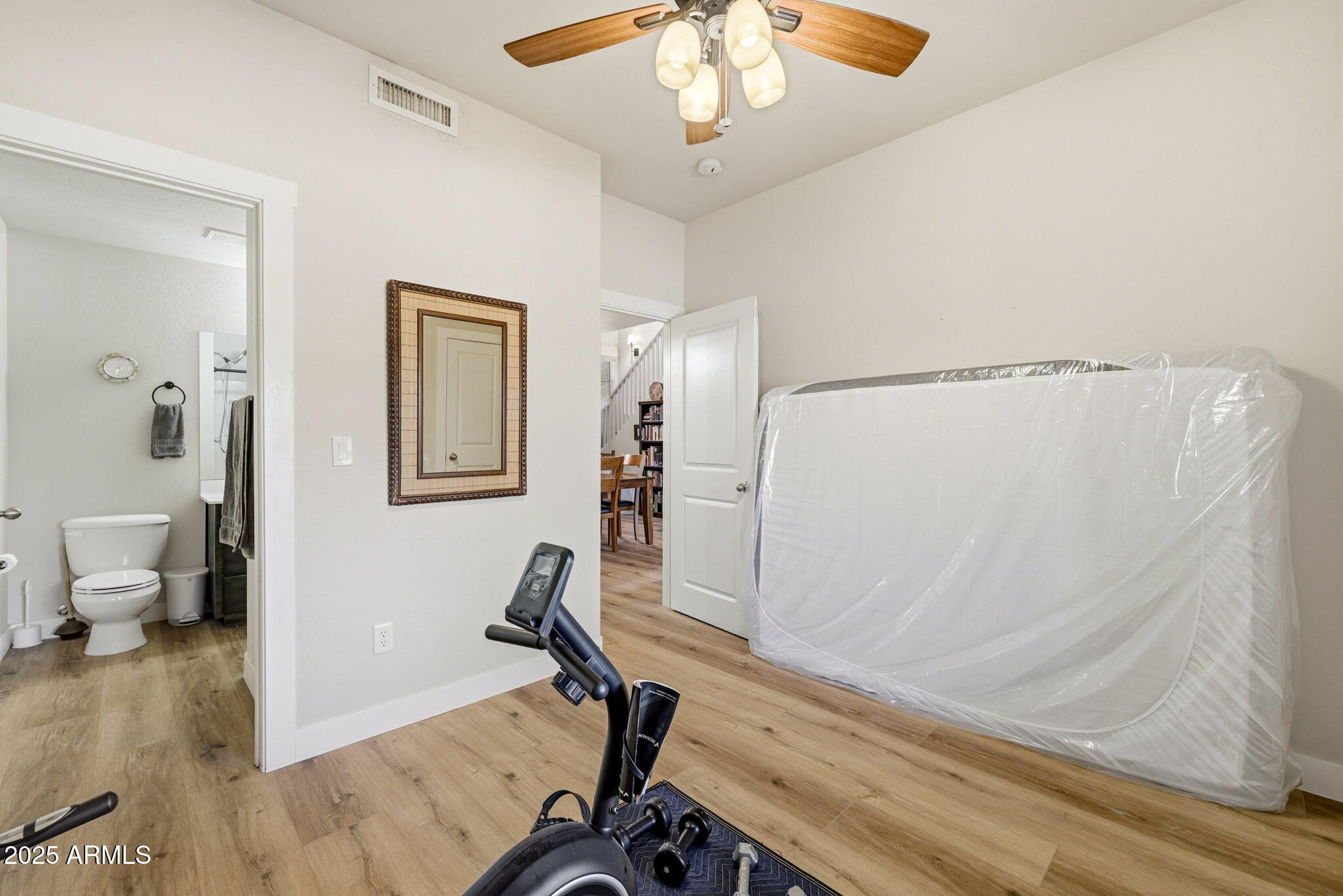 6168 West Starlight Ridge Parkway Lakeside, AZ 85929 - Photo 14 of 42 a view of a workspace with furniture and a bedroom