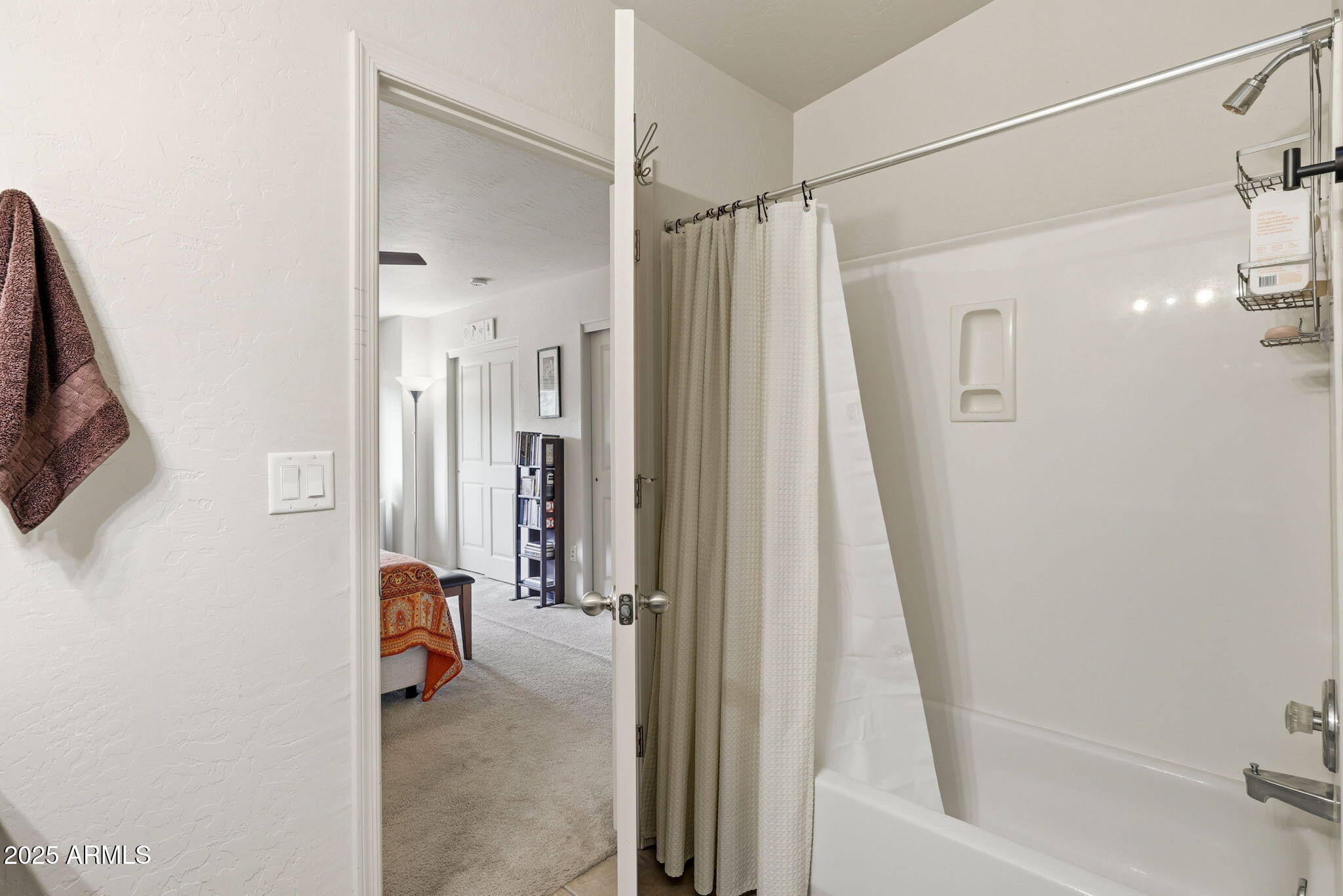 6168 West Starlight Ridge Parkway Lakeside, AZ 85929 - Photo 23 of 39 a bathroom with a shower and a tub