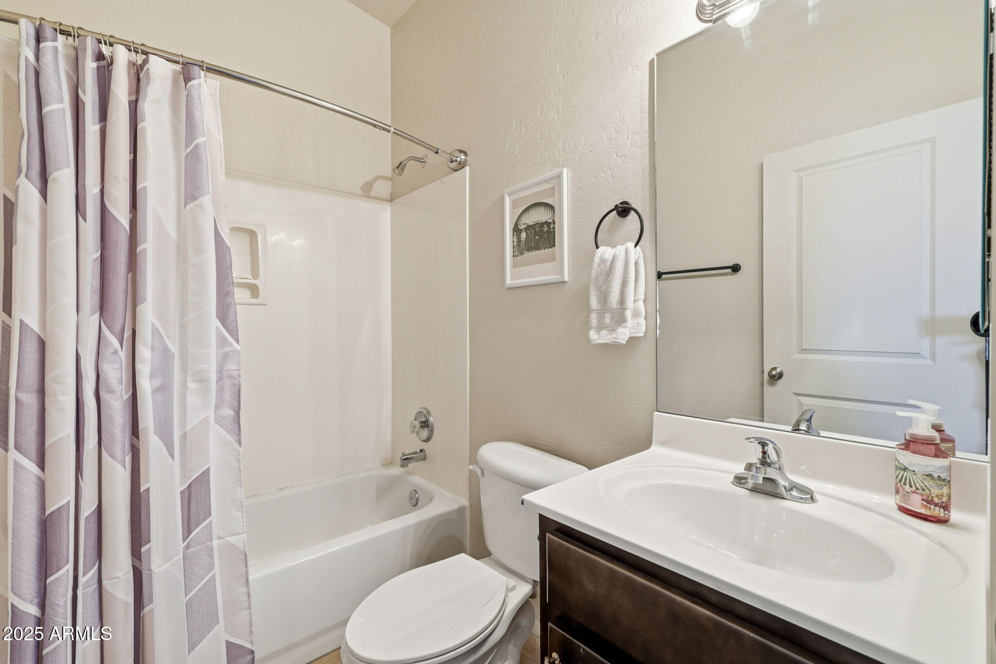6168 West Starlight Ridge Parkway Lakeside, AZ 85929 - Photo 26 of 39 a bathroom with a sink toilet and shower