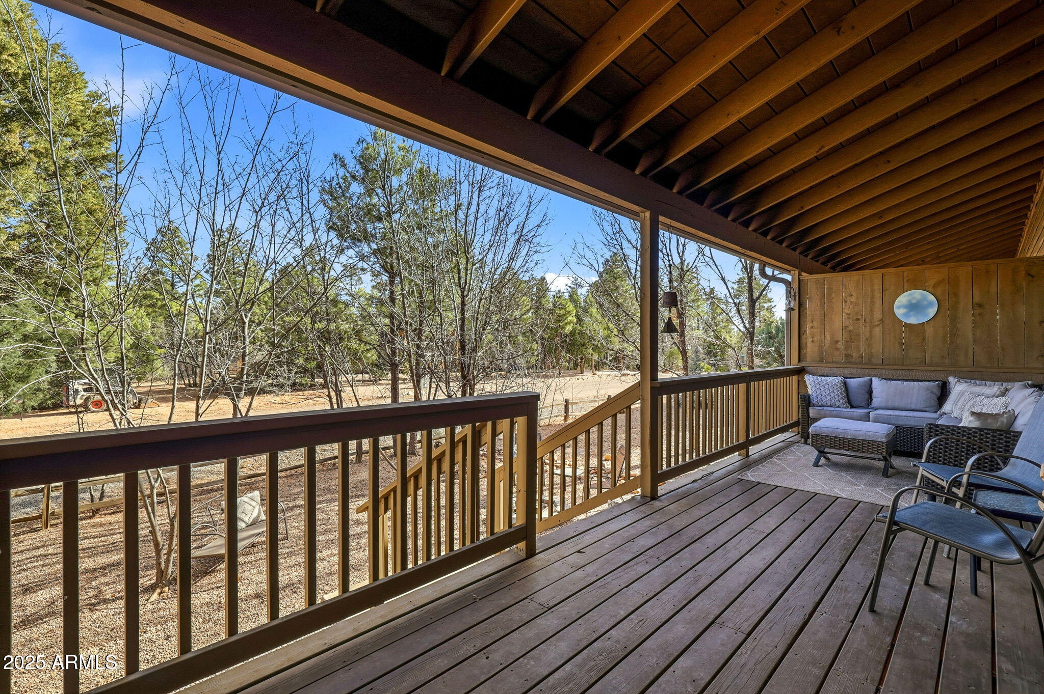 6168 West Starlight Ridge Parkway Lakeside, AZ 85929 - Photo 27 of 39 a view of balcony with furniture and wooden floor
