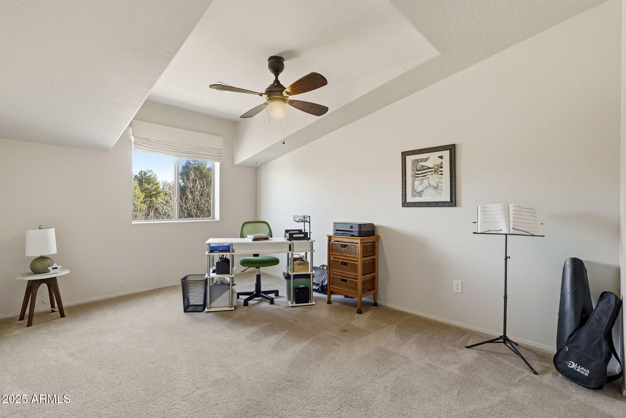 6168 West Starlight Ridge Parkway Lakeside, AZ 85929 - Photo 24 of 42 a view of a livingroom with furniture and a ceiling fan