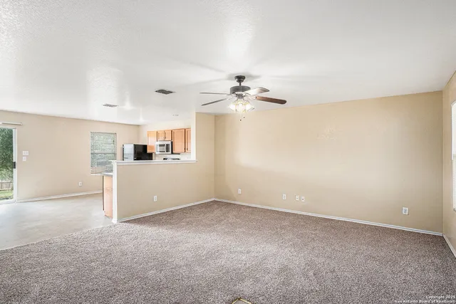 a view of a kitchen with a sink