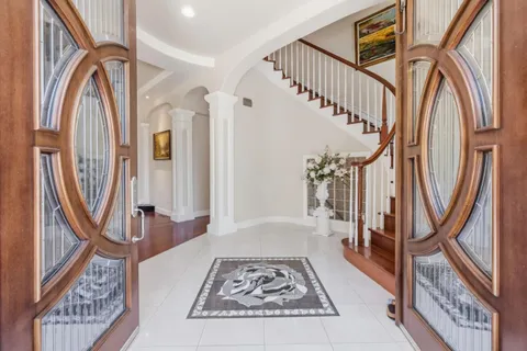 a view of an entryway with staircase