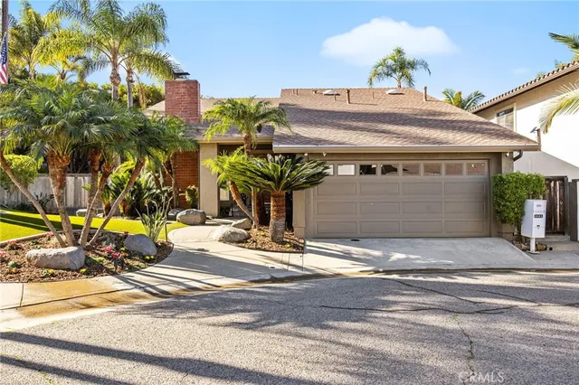 a view of a house with a street