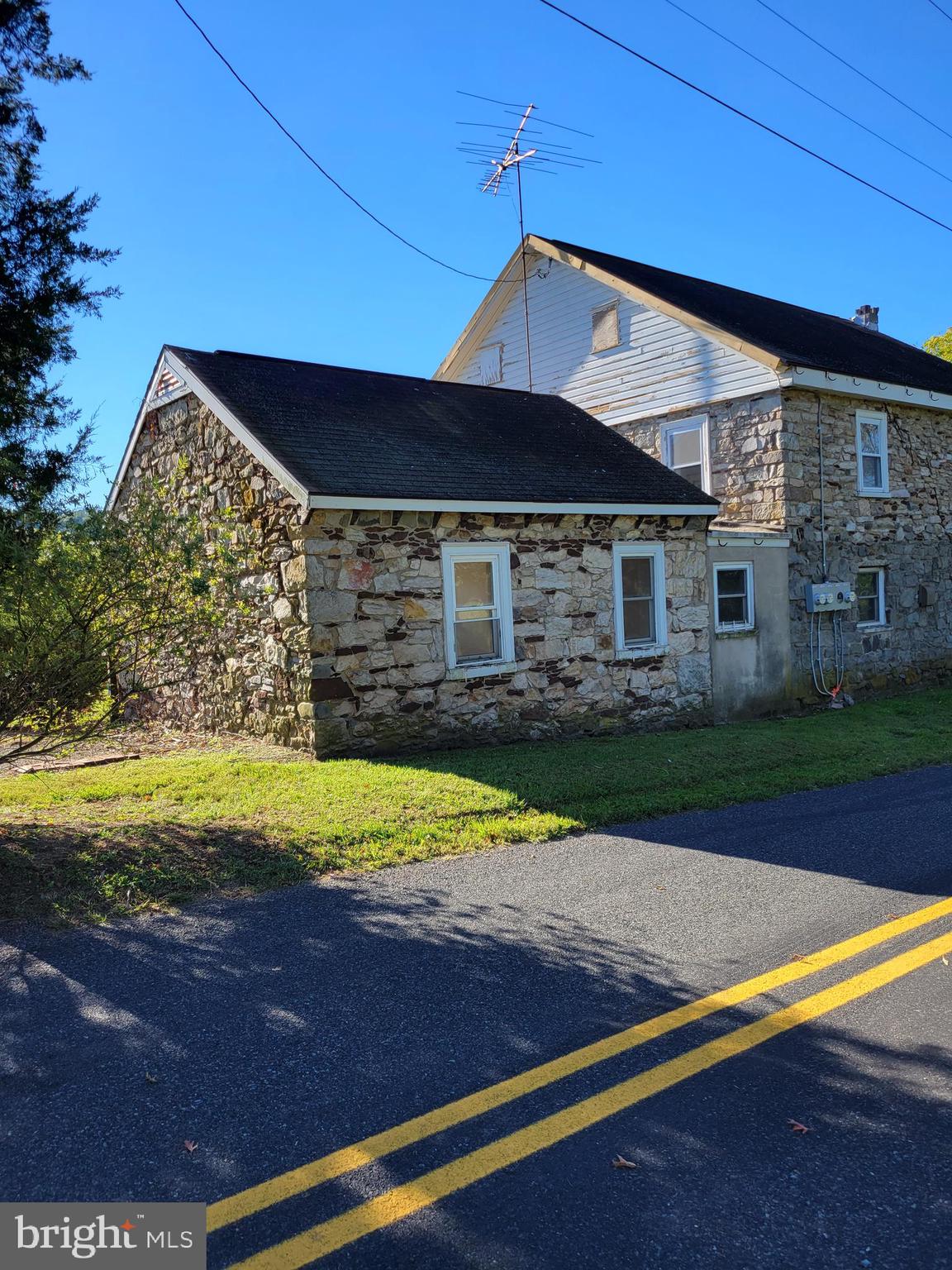 2095 Hosensack Road, Unit B Palm, PA 18070 - Photo 2 of 13 a front view of a house with a yard