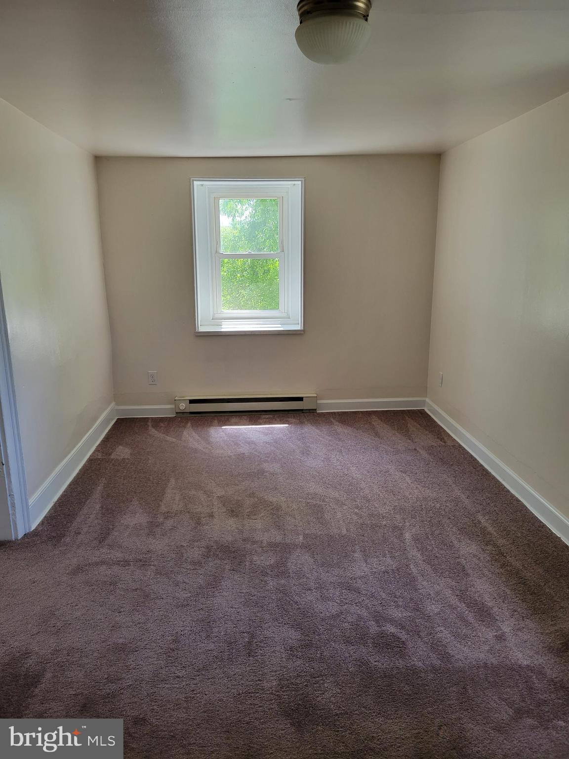 2095 Hosensack Road, Unit B Palm, PA 18070 - Photo 5 of 13 an empty room with windows