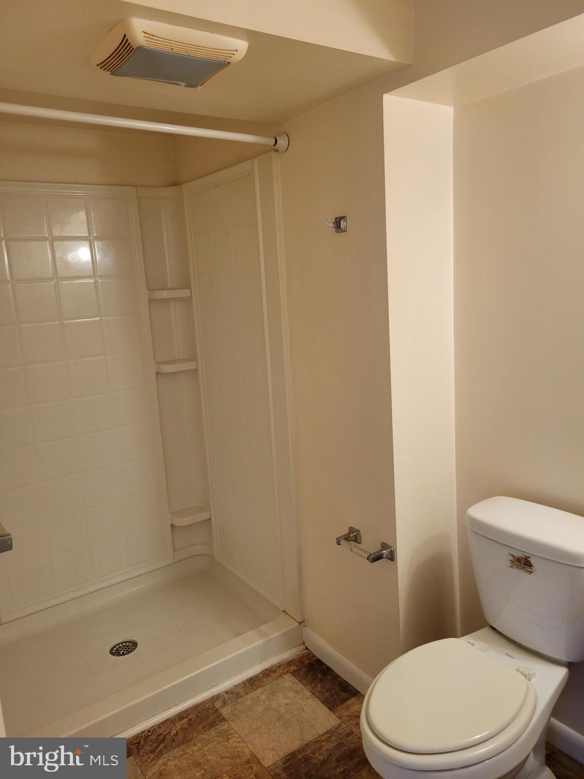 2095 Hosensack Road, Unit B Palm, PA 18070 - Photo 10 of 13 a bathroom with a shower and a toilet