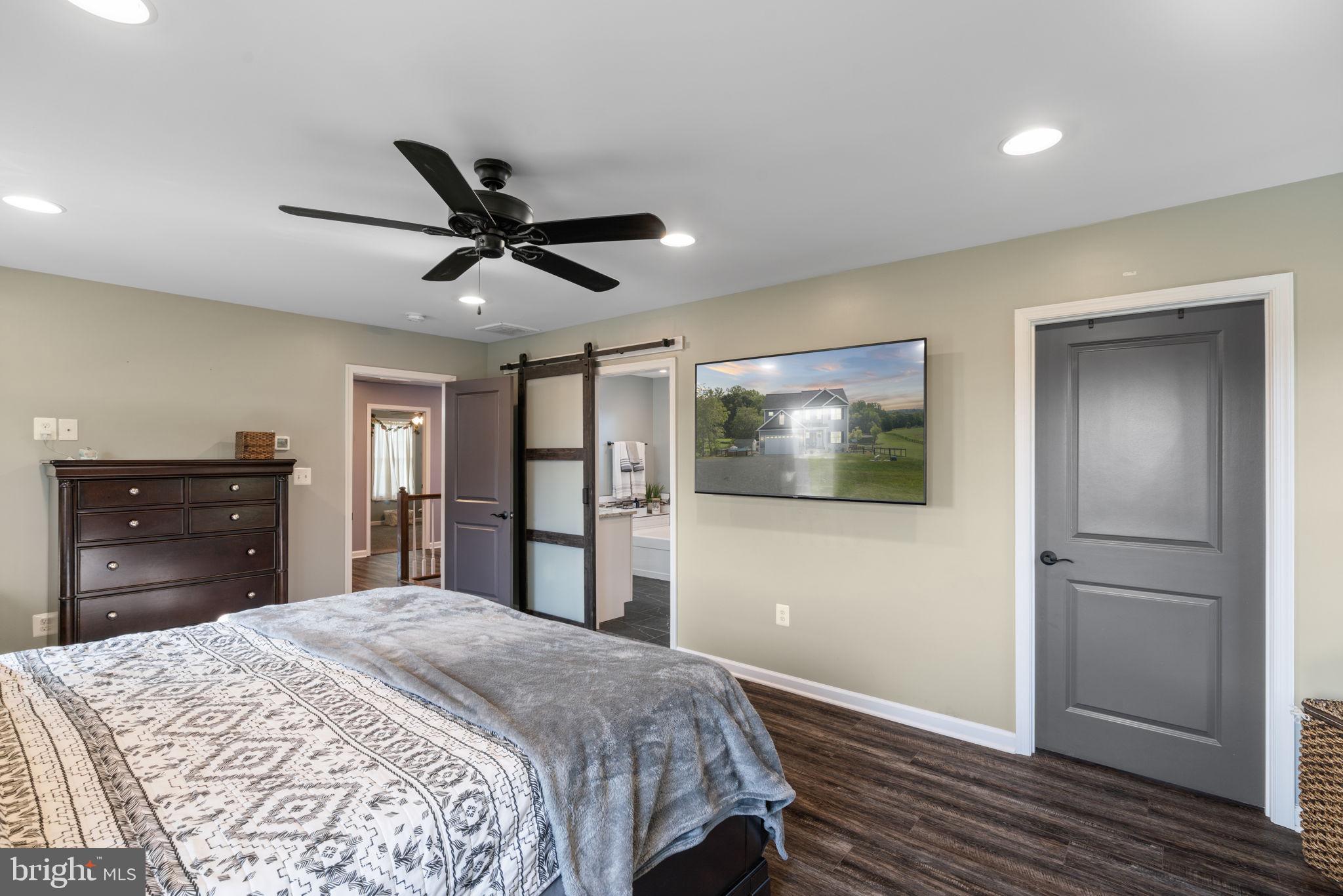 13401 Sillamon Road Goldvein, VA 22720 - Photo 19 of 52 Recessed lights & barn door to en suite