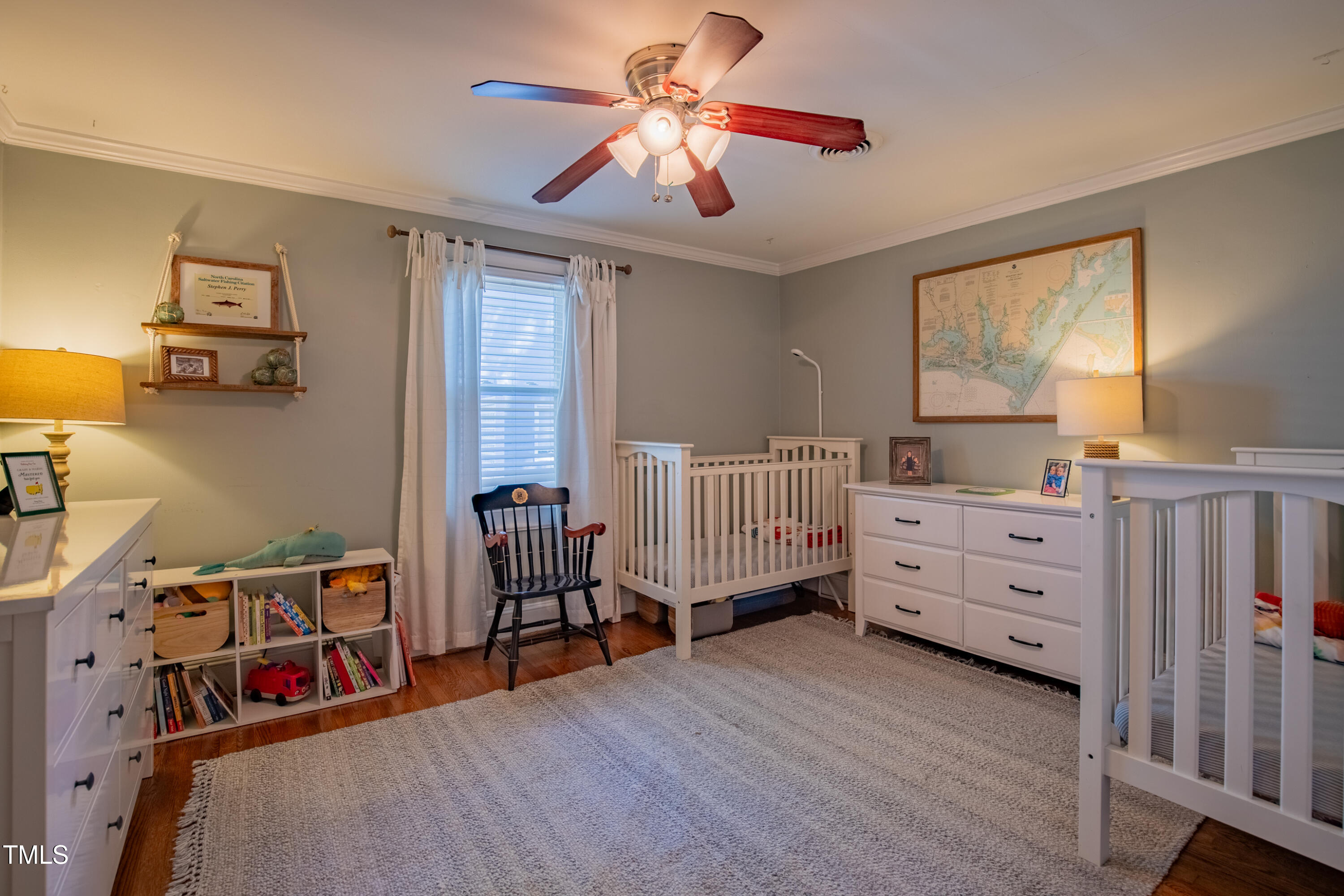 1714 Carson Street Raleigh, NC 27608 - Photo 27 of 38 a bedroom with furniture and a large window