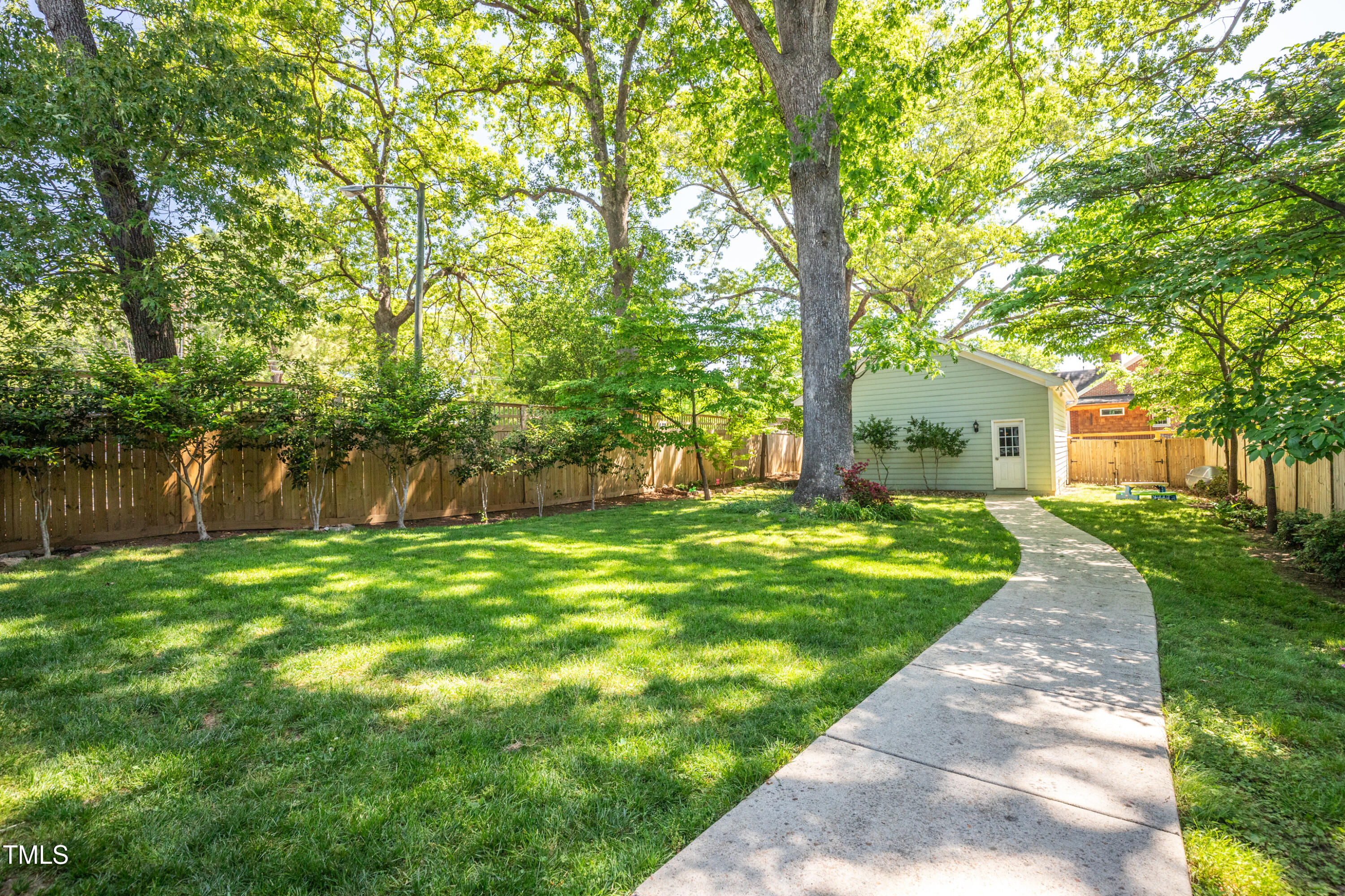 1714 Carson Street Raleigh, NC 27608 - Photo 35 of 38 a front view of a house with a yard