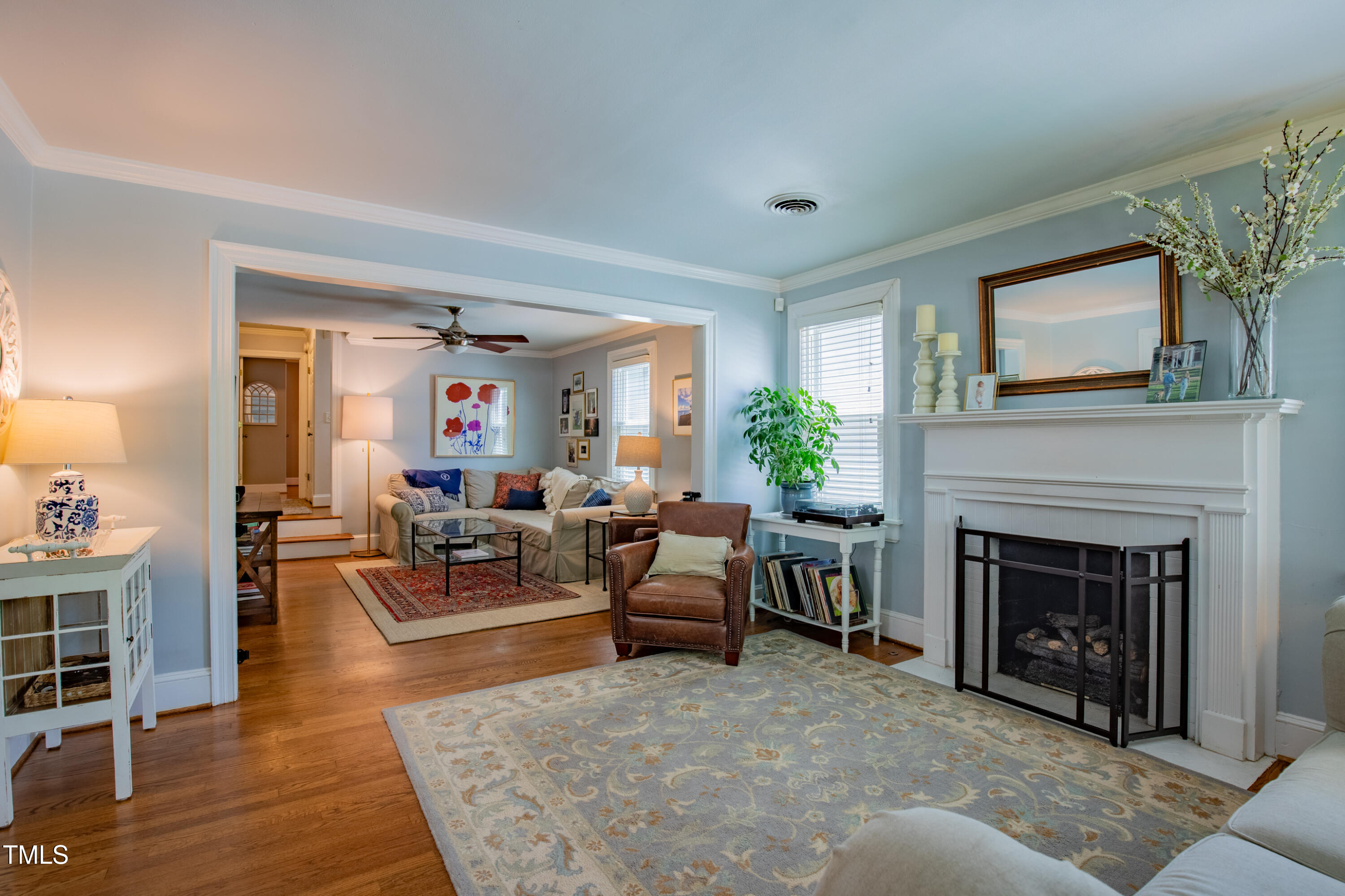 1714 Carson Street Raleigh, NC 27608 - Photo 6 of 38 a living room with furniture and a fireplace