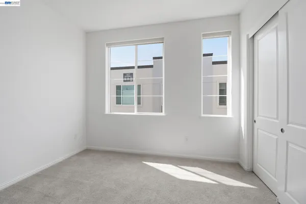 an empty room with windows