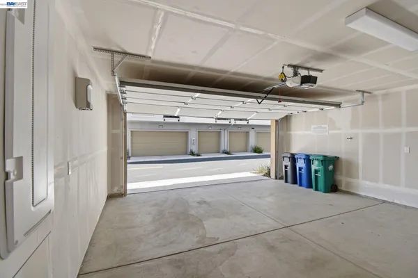 a view of an empty room with washing machine