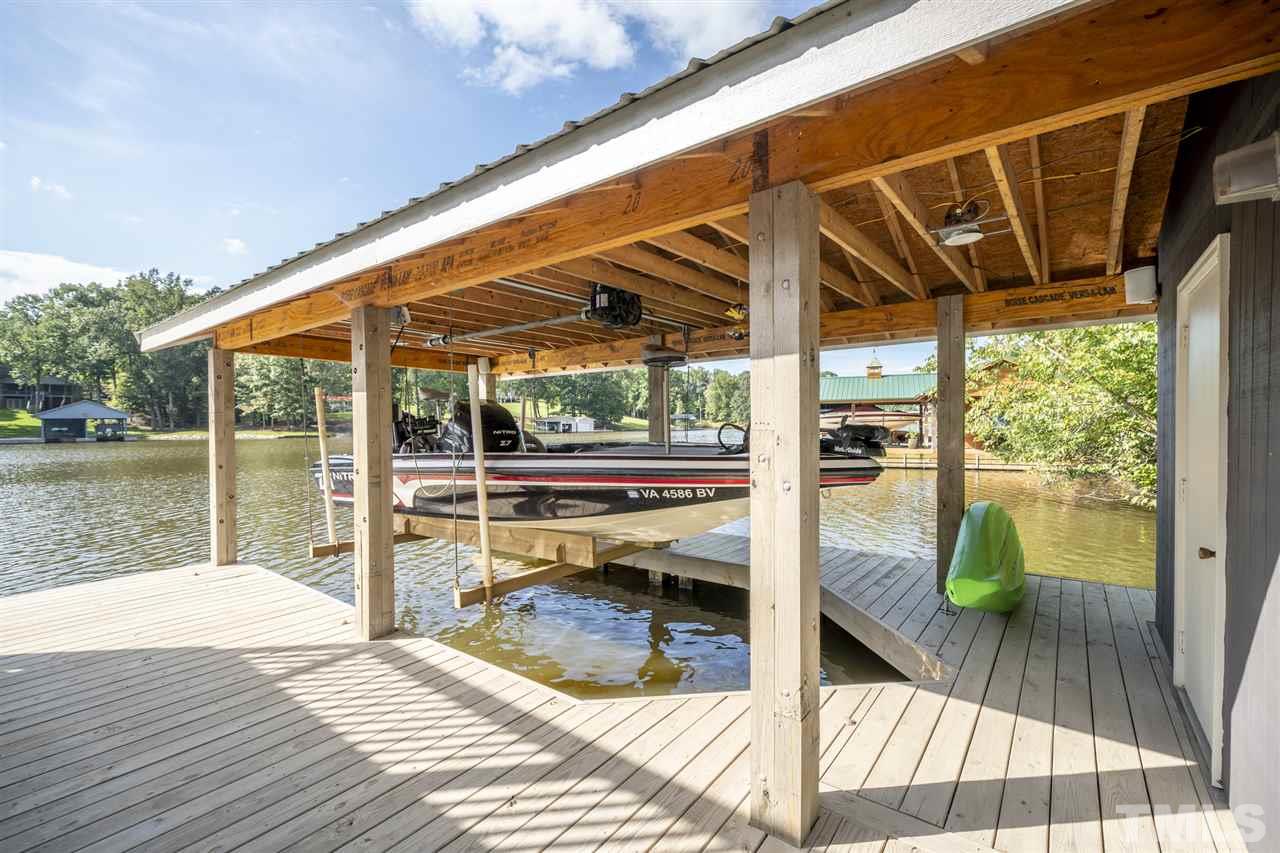 167 Hidden Hills Road Roxboro, NC 27574 - Photo 5 of 25 a view of swimming pool with a patio and a yard