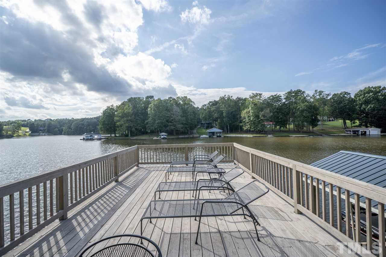 167 Hidden Hills Road Roxboro, NC 27574 - Photo 8 of 25 a view of balcony with wooden floor and fence